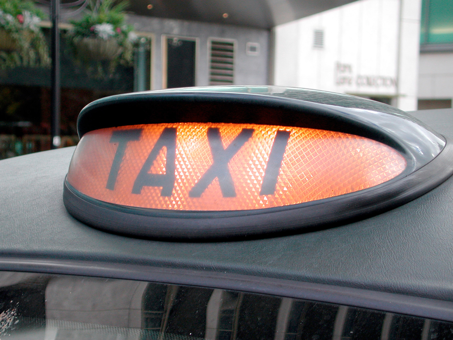 Black taxi sign, London