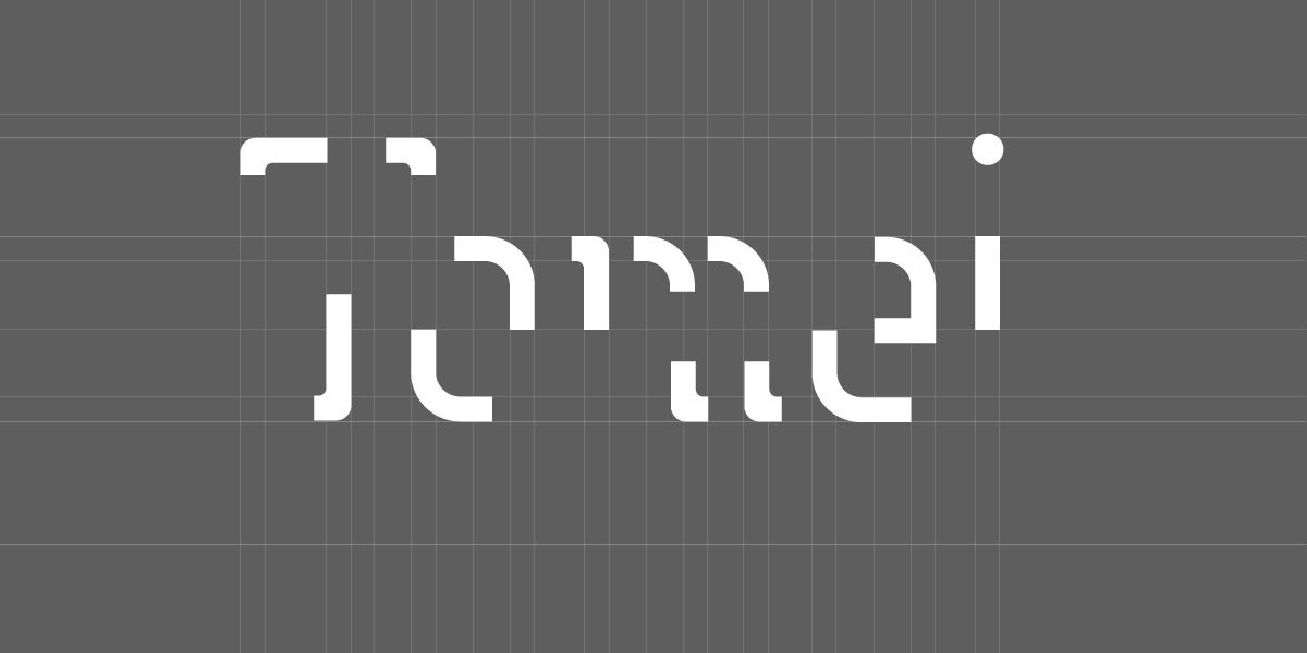 Schriftzug Tomei in der abstrahierten, von Blindenschrift inspirierten Schriftart auf grauem Designraster