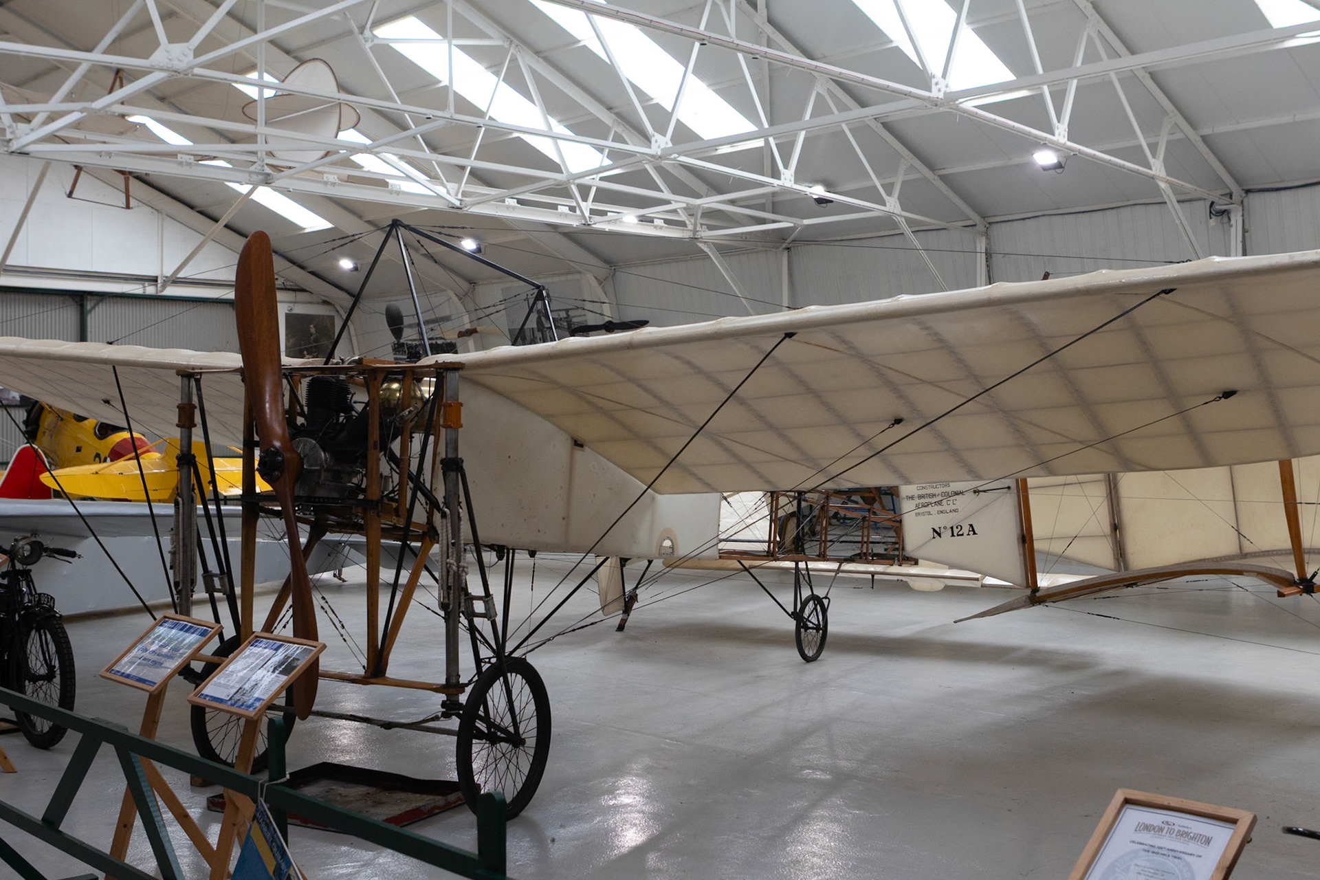 The first really successful Blériot, the Type XI has a wooden fuselage frame braced with supporting struts and tension wires and is only partially fabric covered. The wings, also of wooden construction and fabric covered, include control wires to enable them to be warped for lateral control. They are mounted at shoulder level to the fuselage and braced below by wires from the undercarriage and above to a tubular frame located in front of the cockpit.
