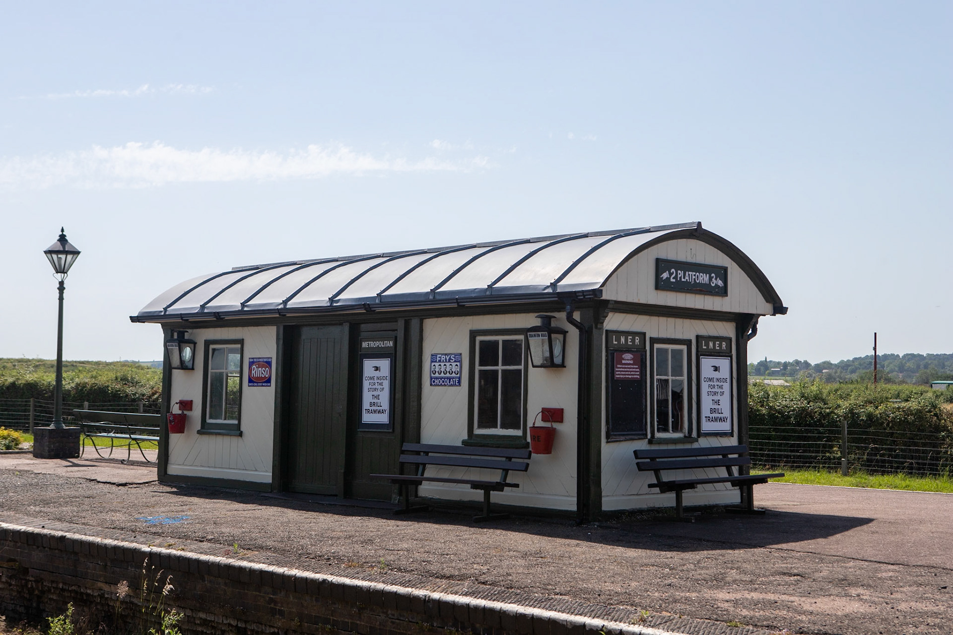 Quainton Road railway station served the area of Quainton, in Buckinghamshire, England; it is sited 44 miles (71 km) from London. Built by the Aylesbury and Buckingham Railway, it was the result of pressure from the 3rd Duke of Buckingham to route the railway near his home at Wotton House and to open a railway station at the nearest point to it. Serving a relatively underpopulated area, Quainton Road was a crude railway station, described as "extremely primitive".