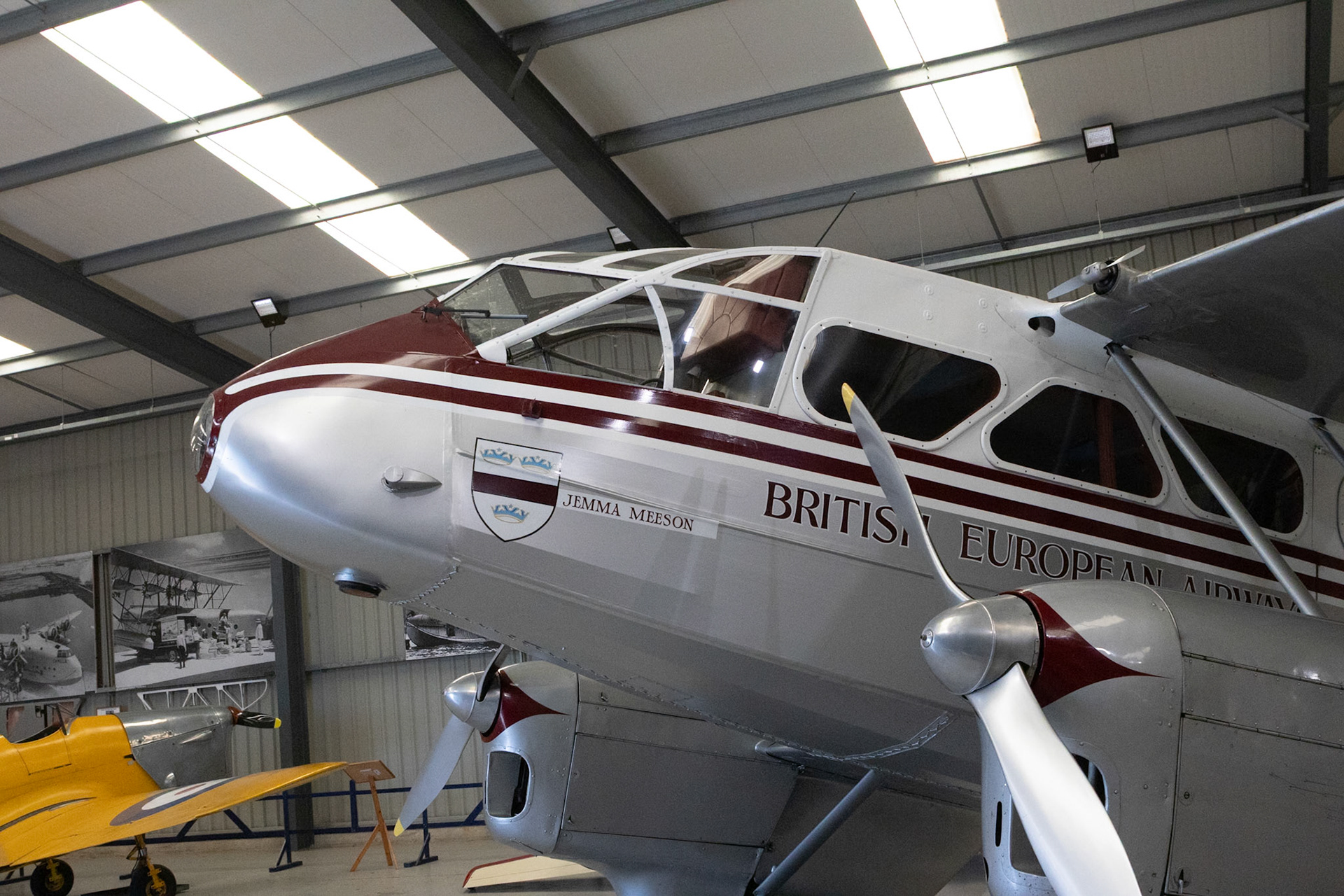 The de Havilland DH.89 Dragon Rapide is a 1930s short-haul biplane airliner developed and produced by British aircraft company de Havilland. Capable of accommodating 6–8 passengers, it proved an economical and durable craft with its strong lightweight plywood construction.Developed during the early 1930s, the Dragon Rapide was essentially a smaller, twin-engined version of the four-engined DH.86 Express, and shared a number of common features, such as its tapered wings, streamlined fairings and Gipsy Six engines. First named the "Dragon Six", the type was marketed as "Dragon Rapide" and later simply known as the "Rapide". Upon its introduction in summer 1934, it proved to be a popular aircraft with airlines and private civil operators alike, attaining considerable foreign sales in addition to its domestic use.