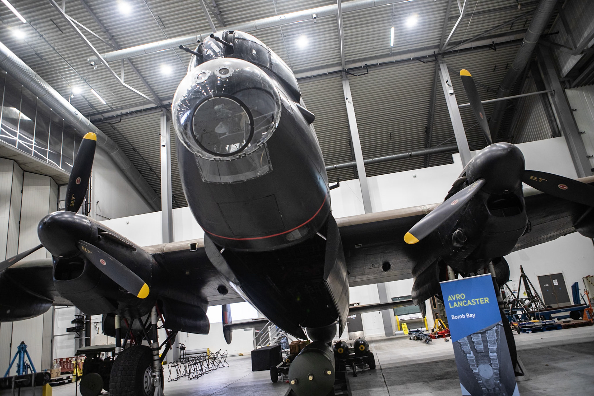 The Avro Lancaster, commonly known as the Lancaster Bomber, is a British Second World War heavy bomber. It was designed and manufactured by Avro as a contemporary of the Handley Page Halifax, both bombers having been developed to the same specification, as well as the Short Stirling, all three aircraft being four-engine heavy bombers adopted by the Royal Air Force (RAF) during the same era.