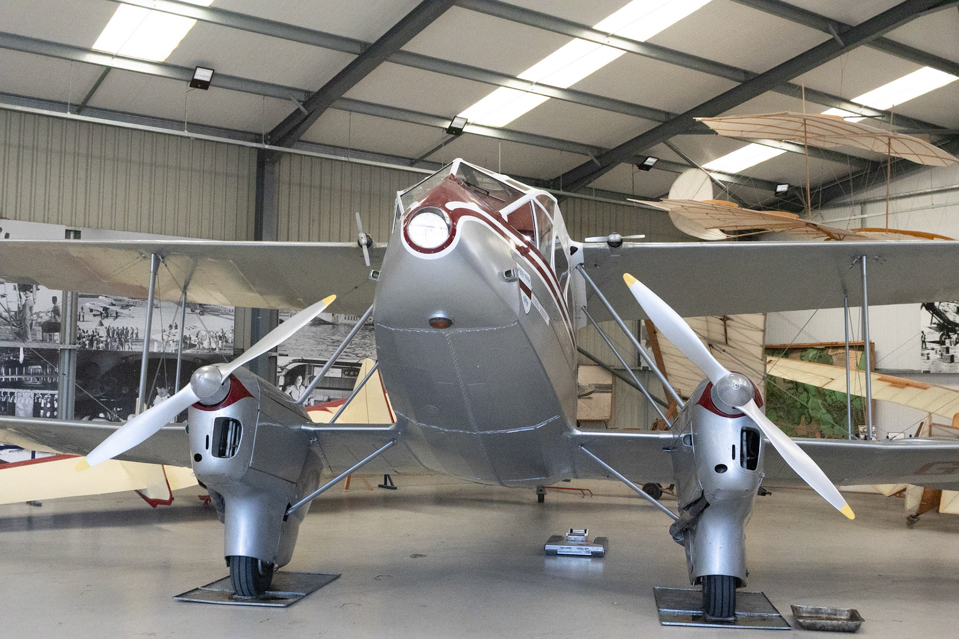 The de Havilland DH.89 Dragon Rapide is a 1930s short-haul biplane airliner developed and produced by British aircraft company de Havilland. Capable of accommodating 6–8 passengers, it proved an economical and durable craft with its strong lightweight plywood construction.Developed during the early 1930s, the Dragon Rapide was essentially a smaller, twin-engined version of the four-engined DH.86 Express, and shared a number of common features, such as its tapered wings, streamlined fairings and Gipsy Six engines. First named the "Dragon Six", the type was marketed as "Dragon Rapide" and later simply known as the "Rapide". Upon its introduction in summer 1934, it proved to be a popular aircraft with airlines and private civil operators alike, attaining considerable foreign sales in addition to its domestic use.
