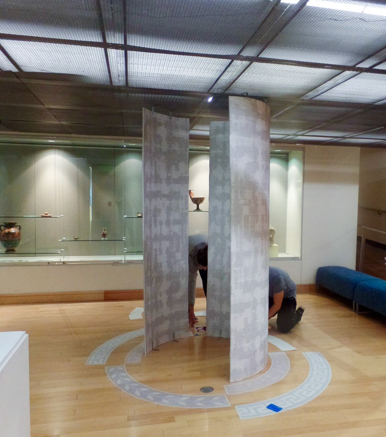 The challenges the graphic design class faced were planning, designing and executing an exhibit that functionally displays the objects in a coherent organized manner.