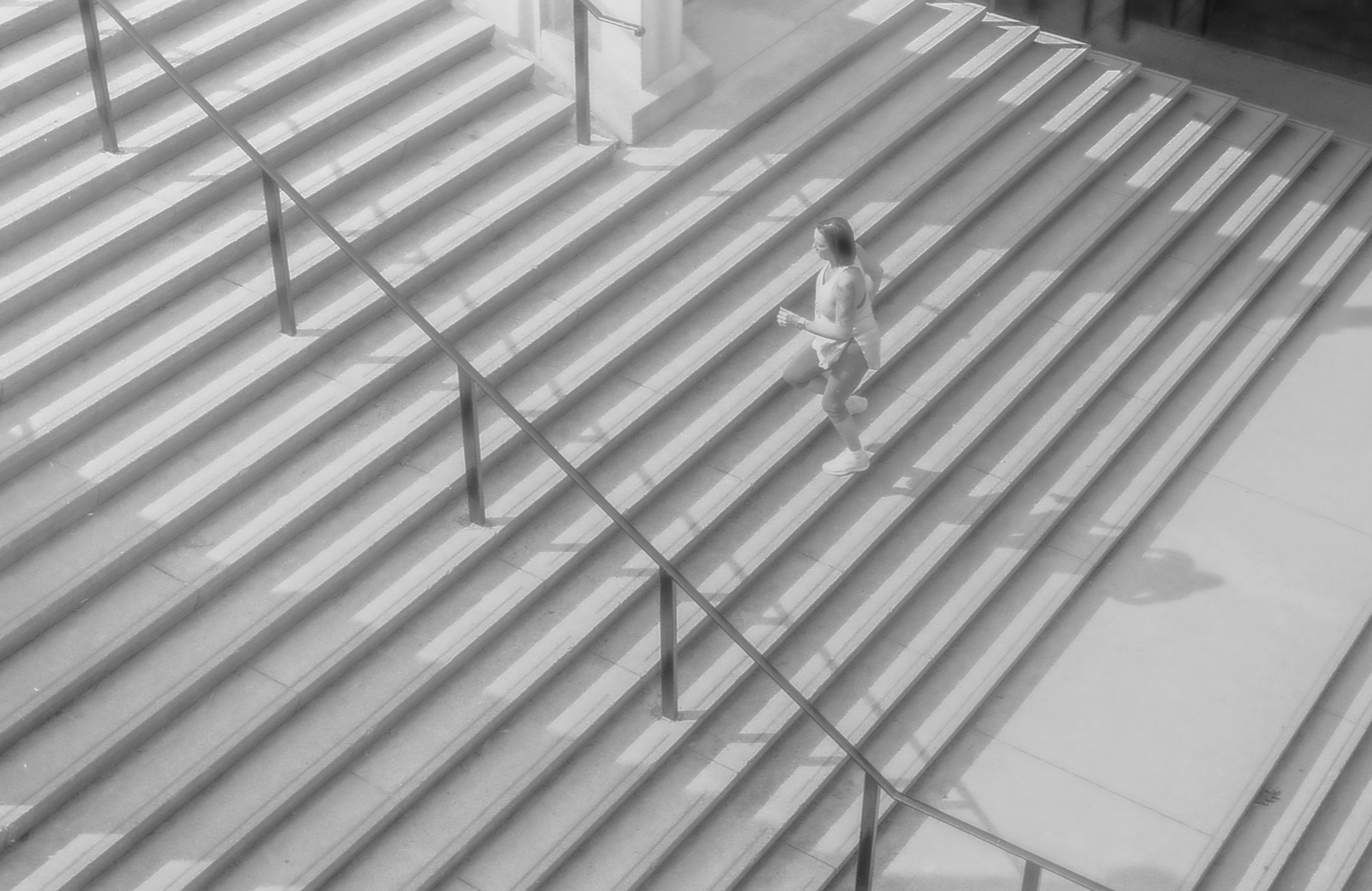 Across The Shadows, Ottawa - 135 film Along the stretches of shadow. I thought I saw you, I thought I knew you once. Keep running, keep going & I hope you get to wherever you're going.