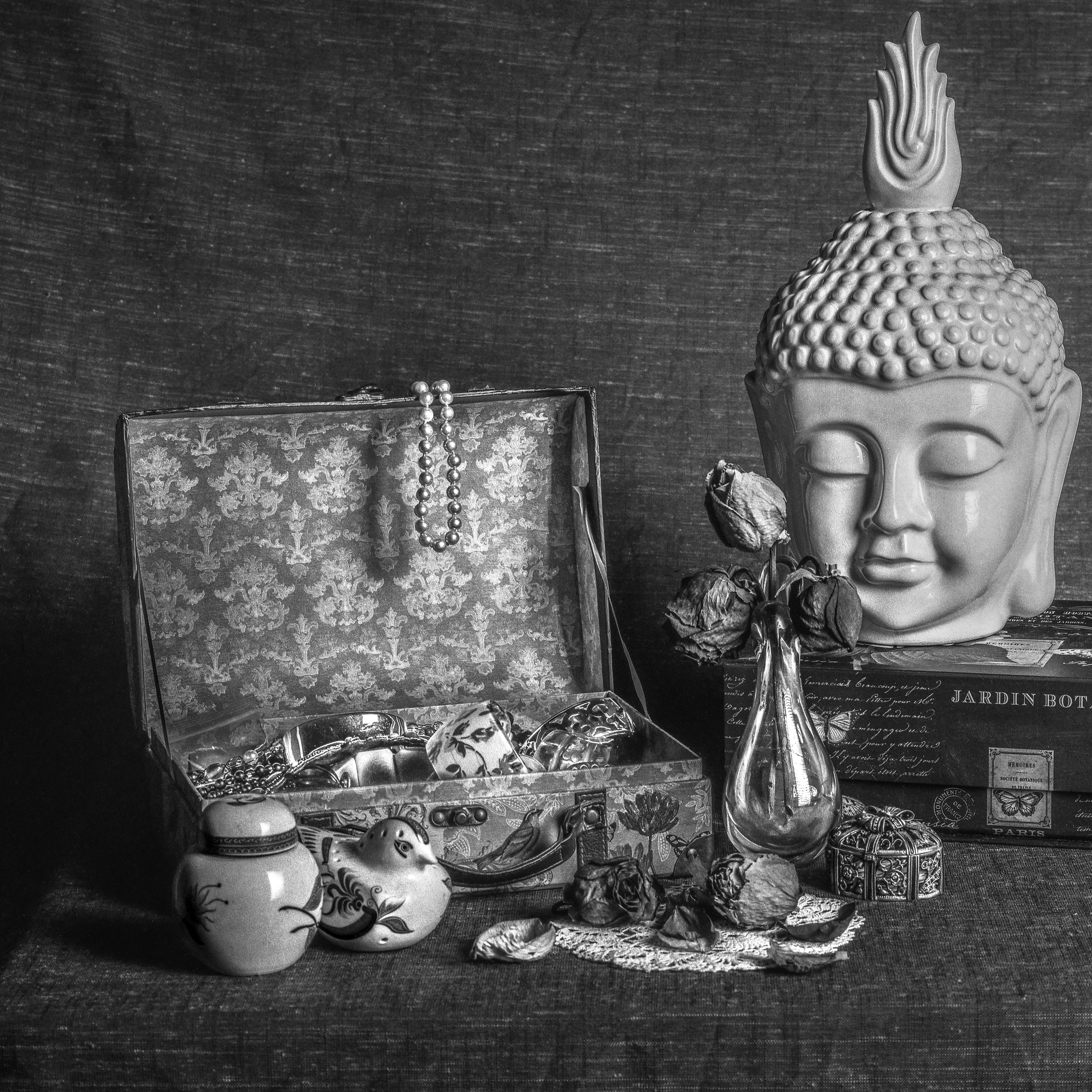 This dream is about a traveler of great distances & her changing room where she puts on costumes & dabs perfume behind her ears to mask her sent. I open the door slowly to reveal the table full of costume jewellery & the sent of patchouli & rosemary still in the air. The room is empty & I am alone.