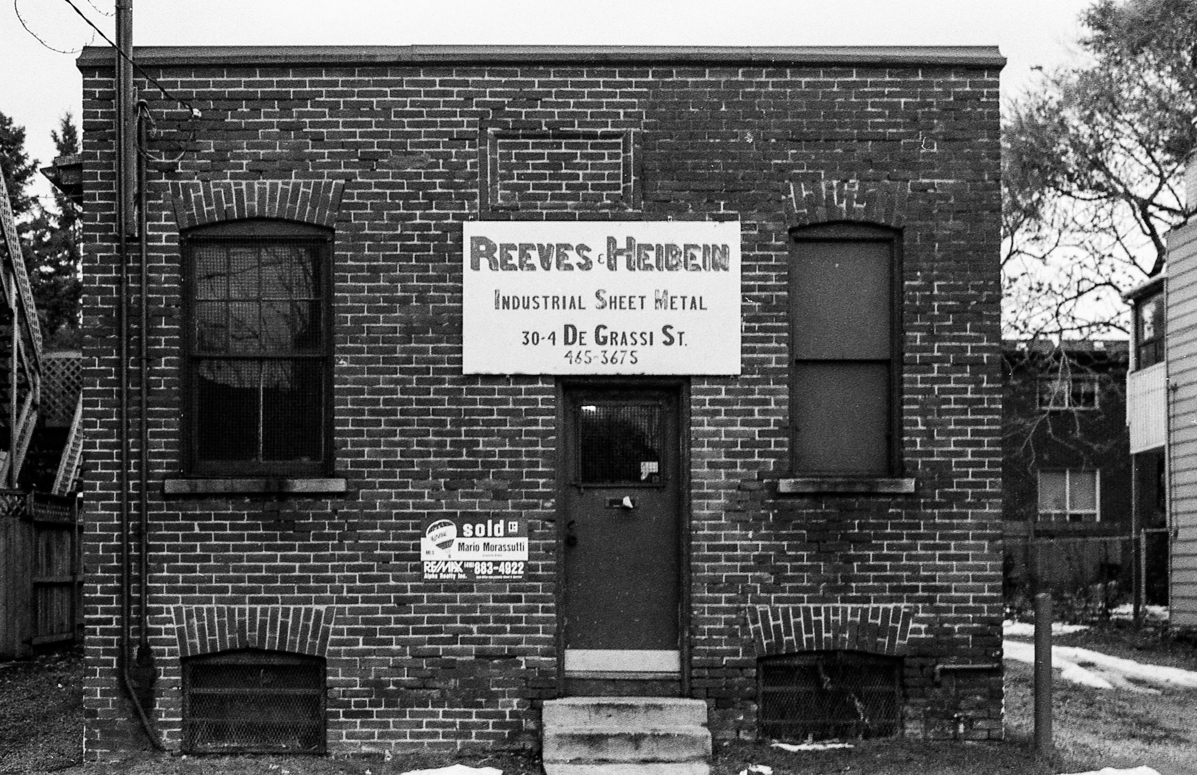 Reeves - 135 film (1996) // 30-4 De Grassi Street For Sale. Toronto, Ontario around 1996 in the winter. You can see this building today on google earth or street view. I use to live down the street from this building & I remember wanting to preserve its look in my mind.
