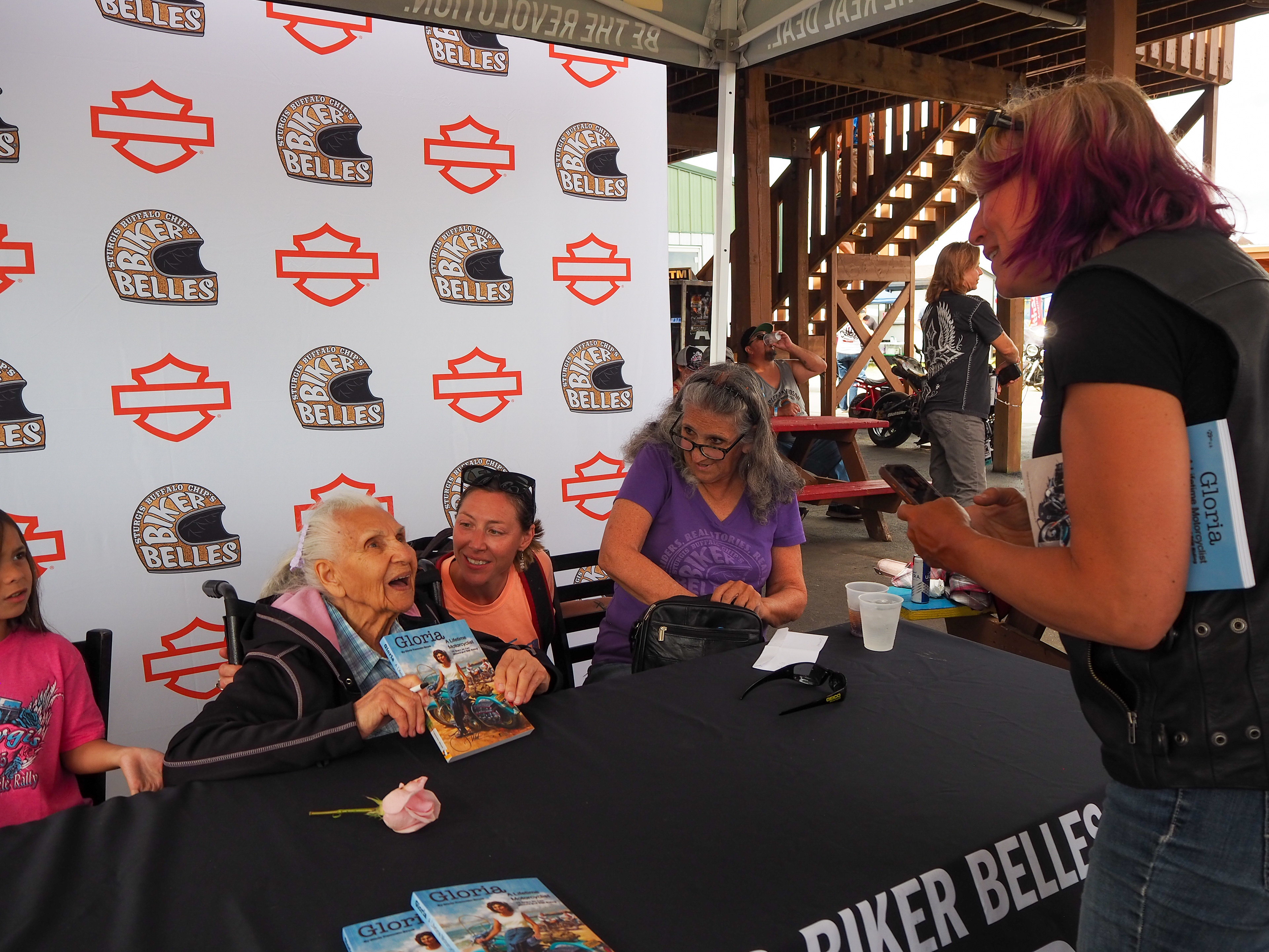 Gloria Struck - signing her book after her 100th B-Day; "Gloria, a Lifetime Motorcyclist"
