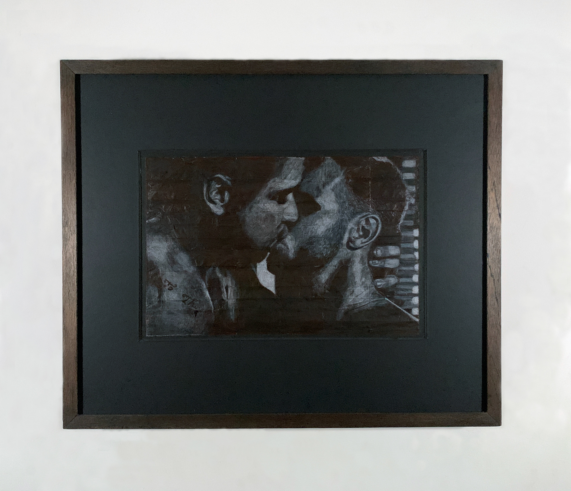 Felix and Omar | Coloured pencil on liquorice fag (cigarette) papers | 51.5cm x 62.1cm x 4.3cm   2026 | Framed in stained and waxed wood with anti-reflective, UV-filtering glazing | £2,000.00