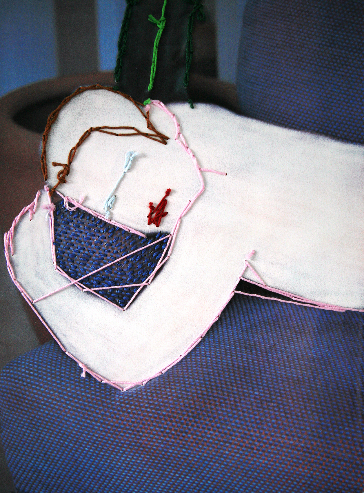 # 7 | 2020 | Embroidery on erased image from a magazine | 20.3cm x 27.5cm