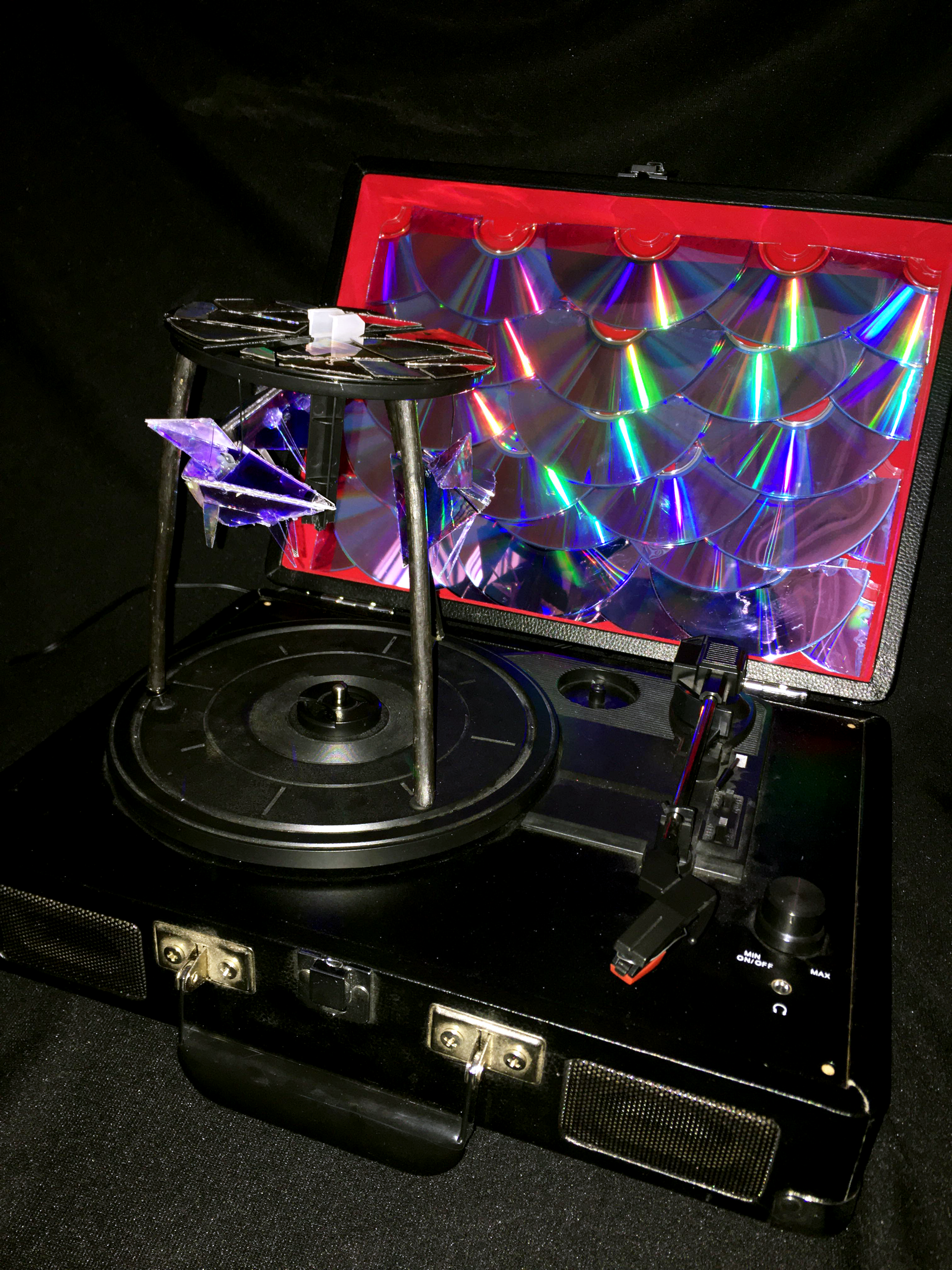 Not-So-Merry-Go-Round ; 4.6x14x10.5" Crosley Record player, blank CD discs, stick, acrylic paint, and glue (2020)
