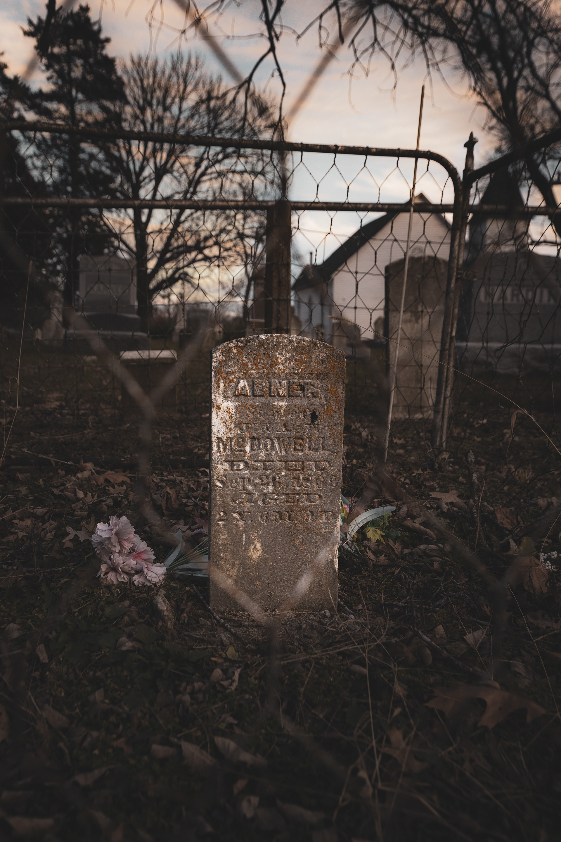 This grave is fenced off, by itself, outside the main cemetery. Church records note only two words: "gypsy baby".