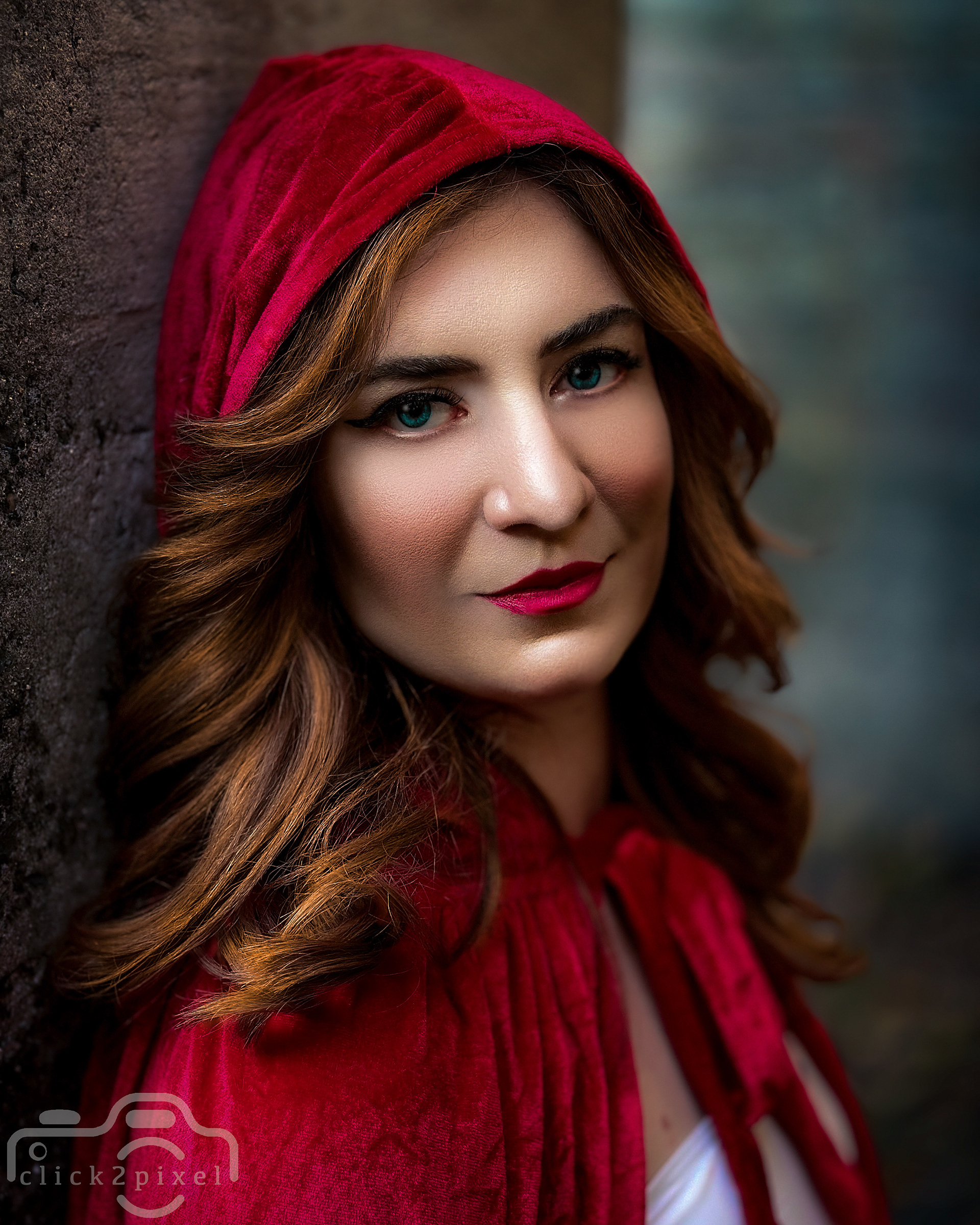 A beauty portrait of Bianca in a red hood