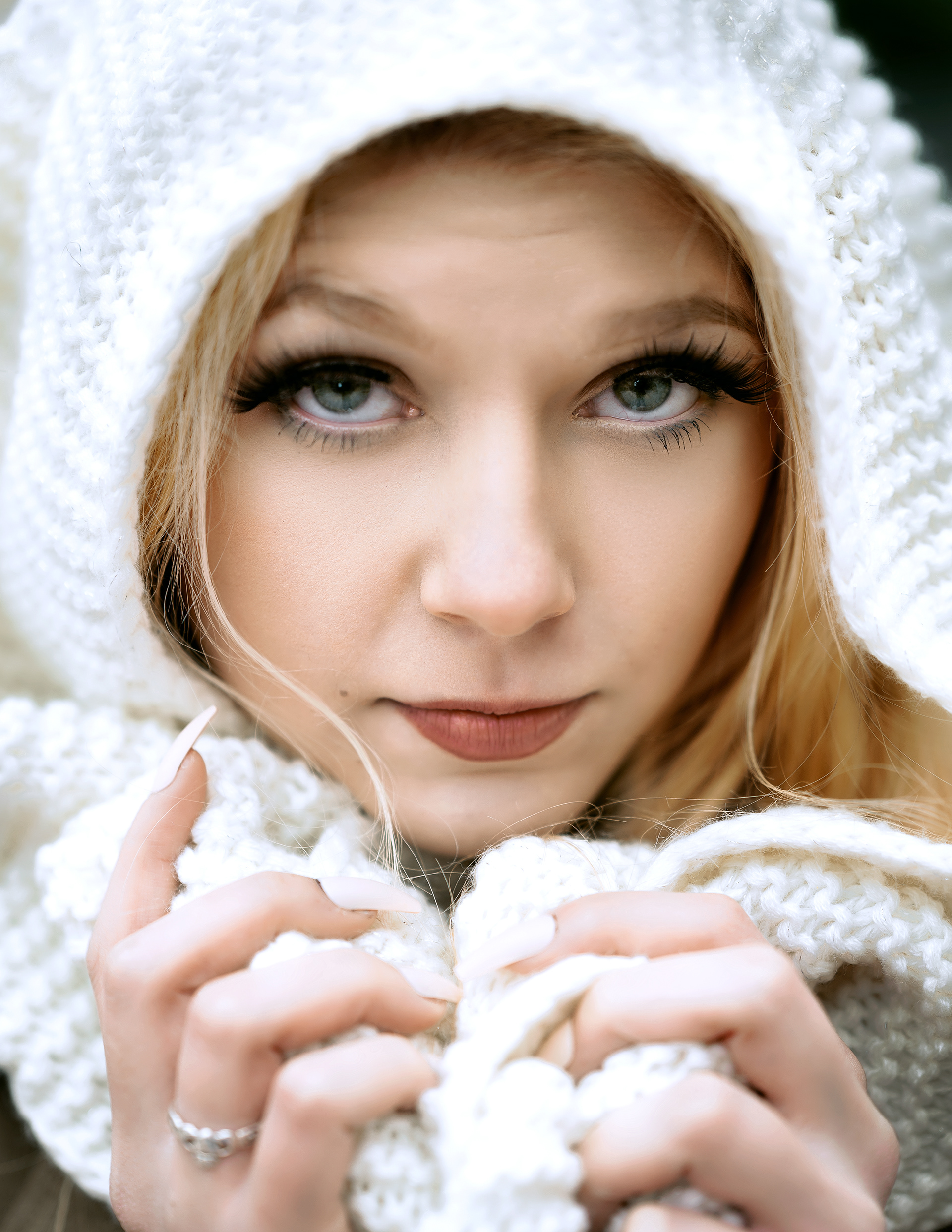 A winter portrait photo of Amanda in an urban setting 