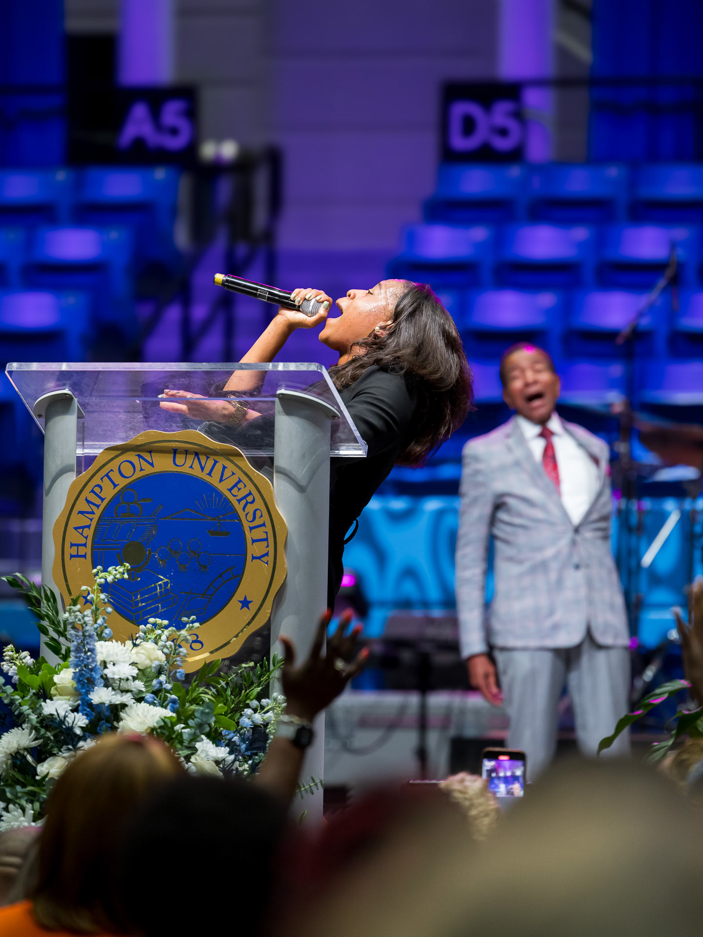 Rev. Marissa Farrow cheered on by her father at the 110th Annual Hampton University Minsters' Conference. Hampton, VA. 2024.
