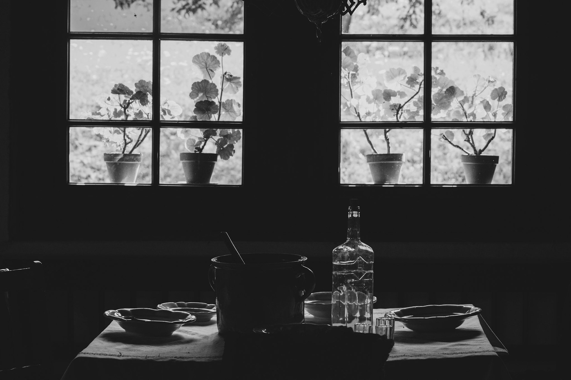 Residential interior design with a view of a city through a large window