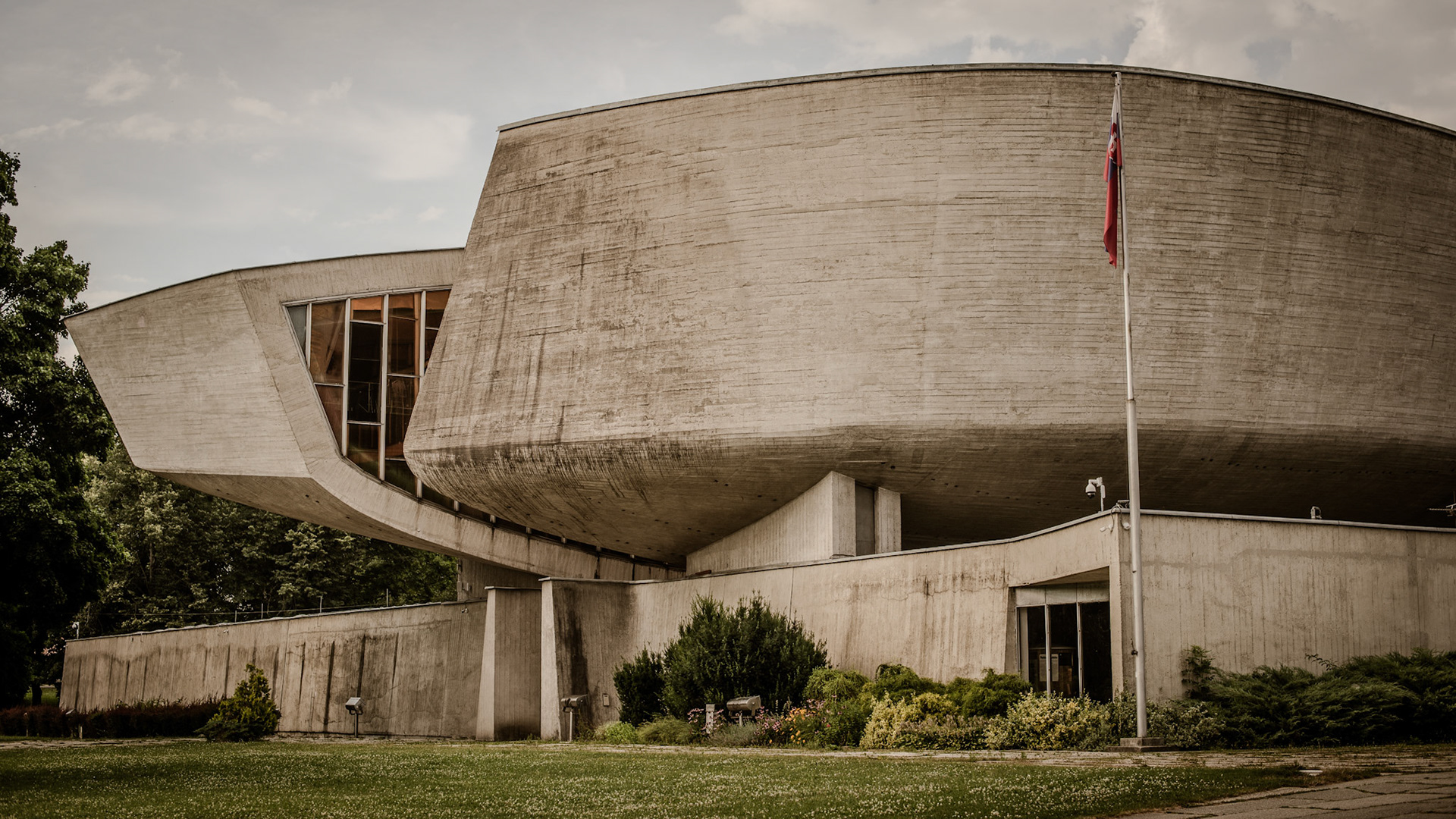 Circular concrete brutalist architecture building
