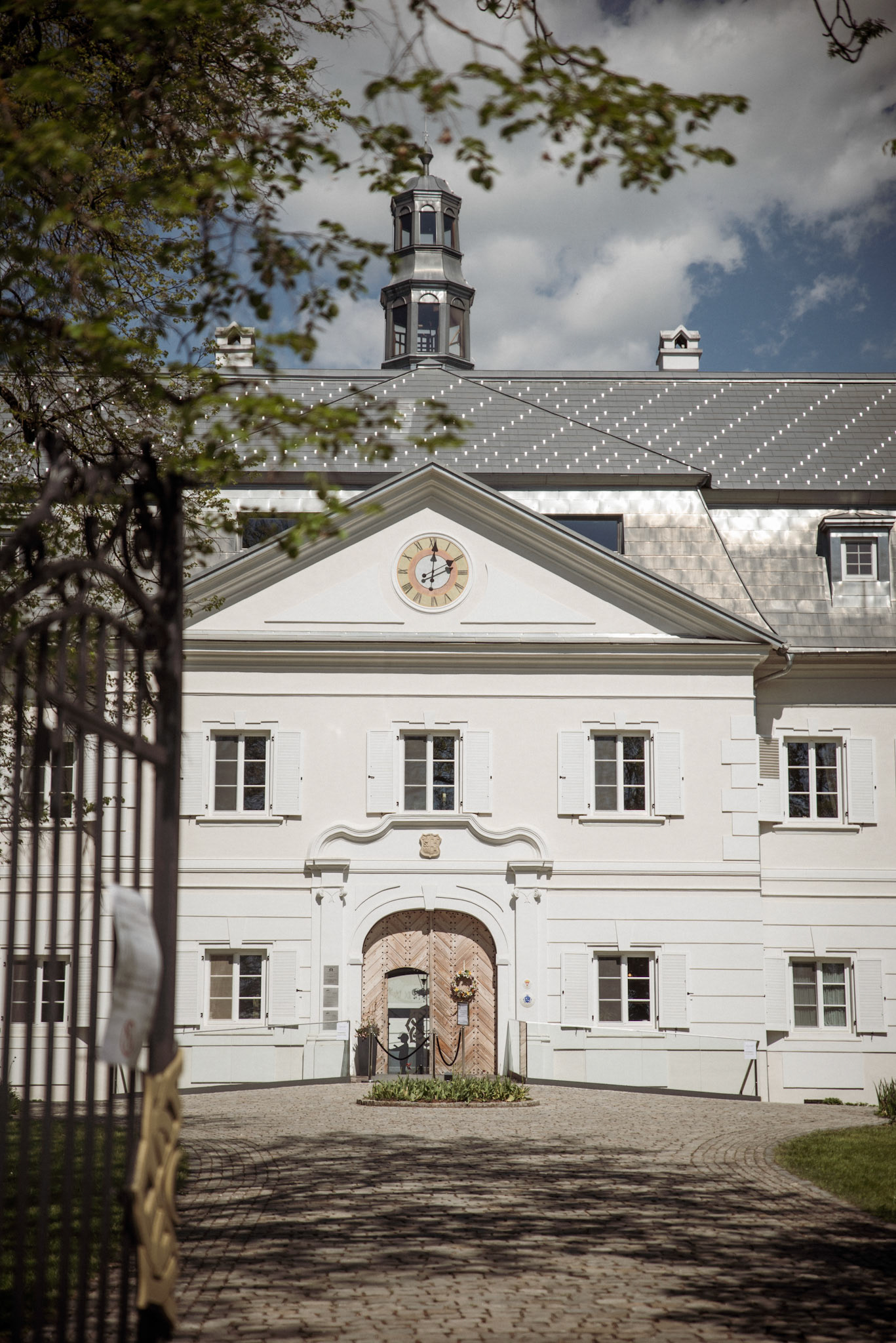 Classical building exterior with symmetrical white facade