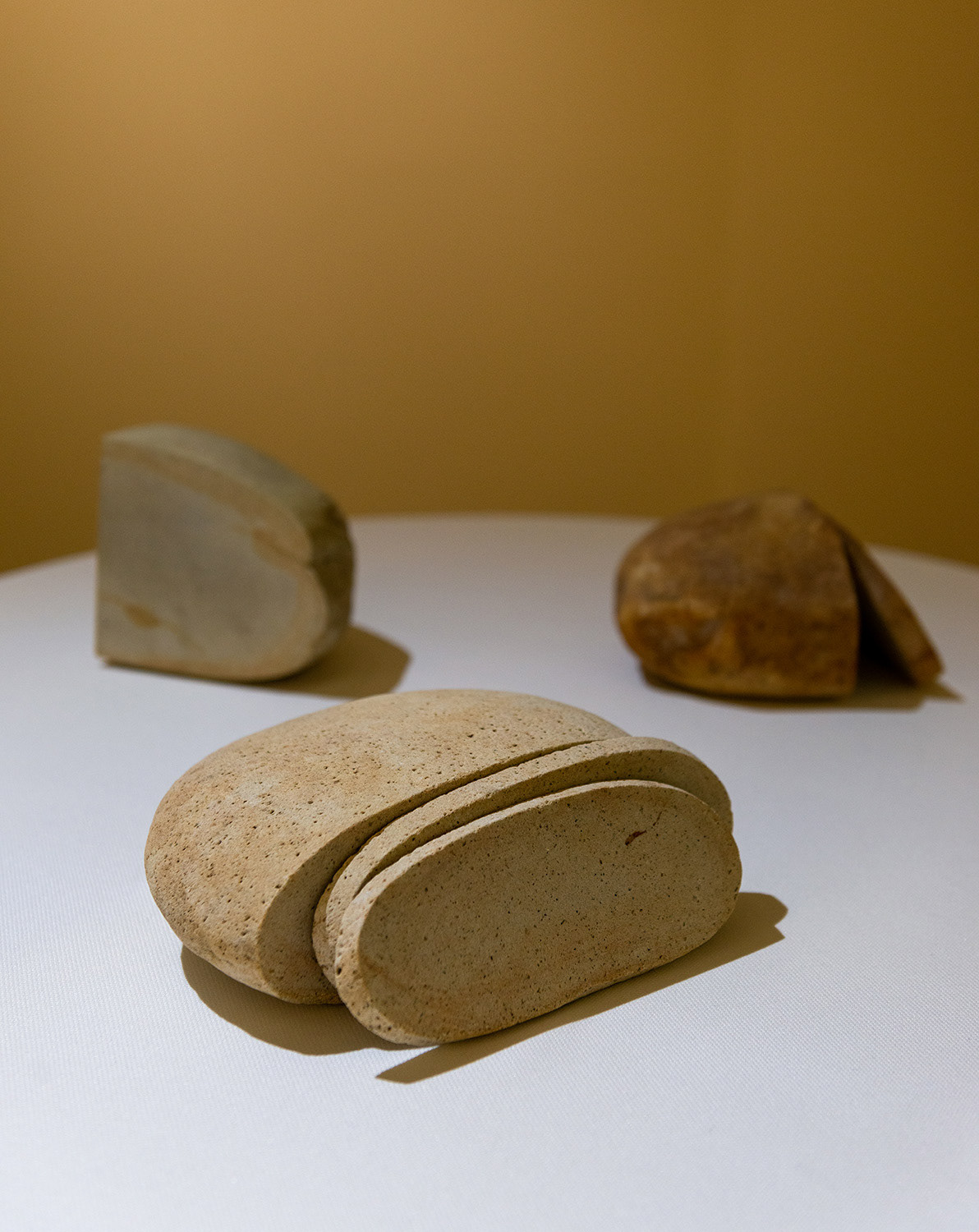 Zhanna Kadyrova Palianytsia, 2022 Found river stones, table, tablecloth