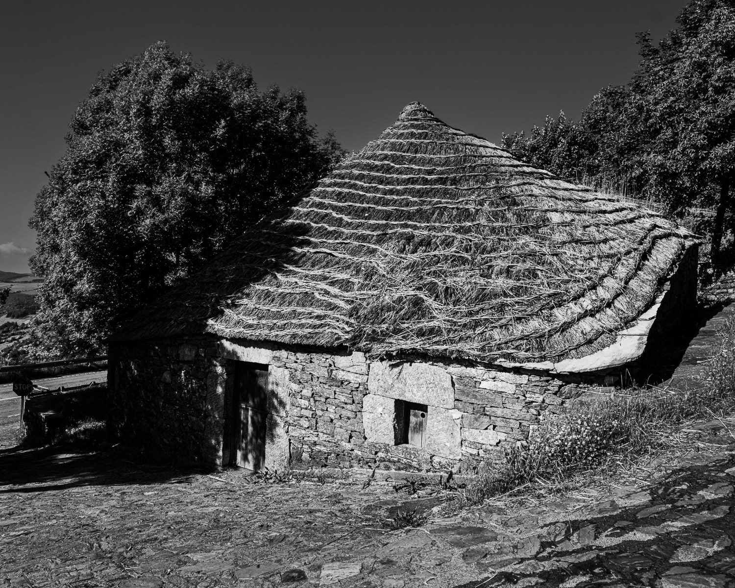 Spain, O Cebreiro. Tatched roof house