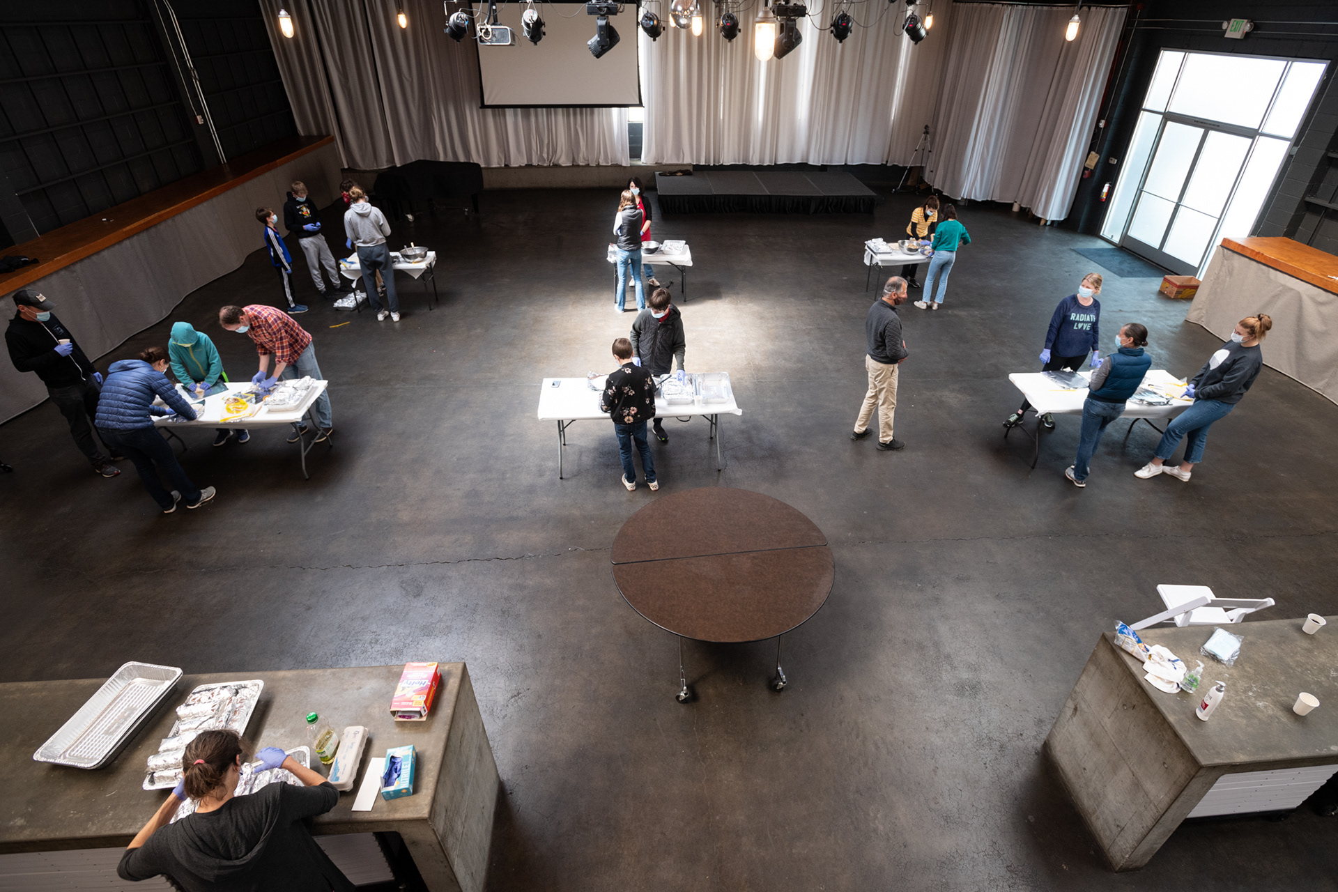 Special precautions are taken during burrito assembly, a continuation of Union Church Seattle's outreach to its neighborhood.