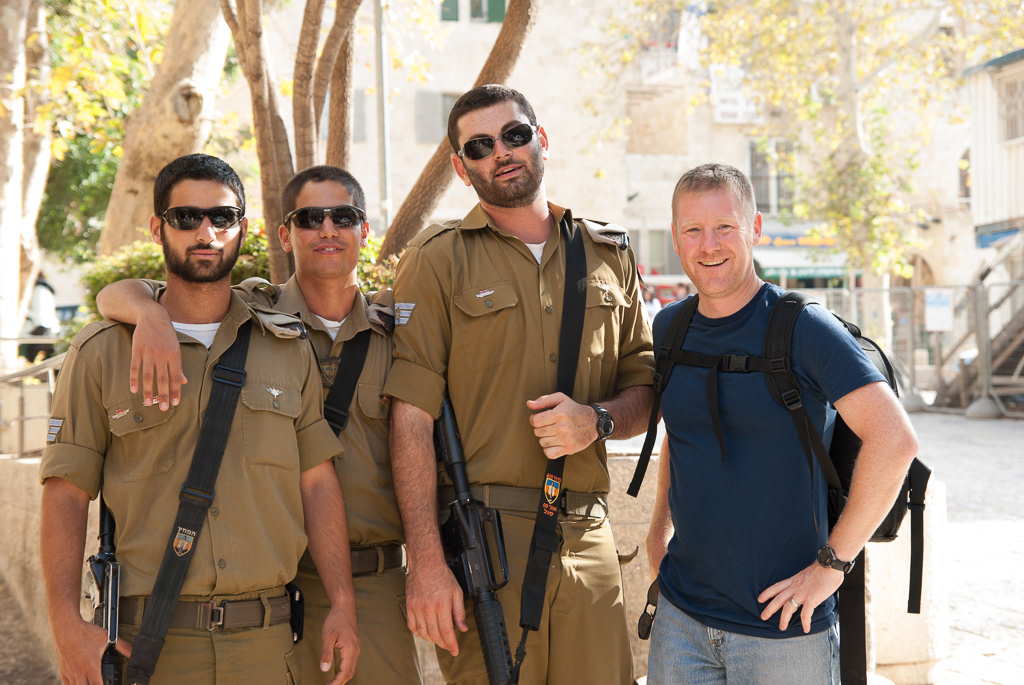 The photographer following a conversation with these young men in the Israeli Defense Force.