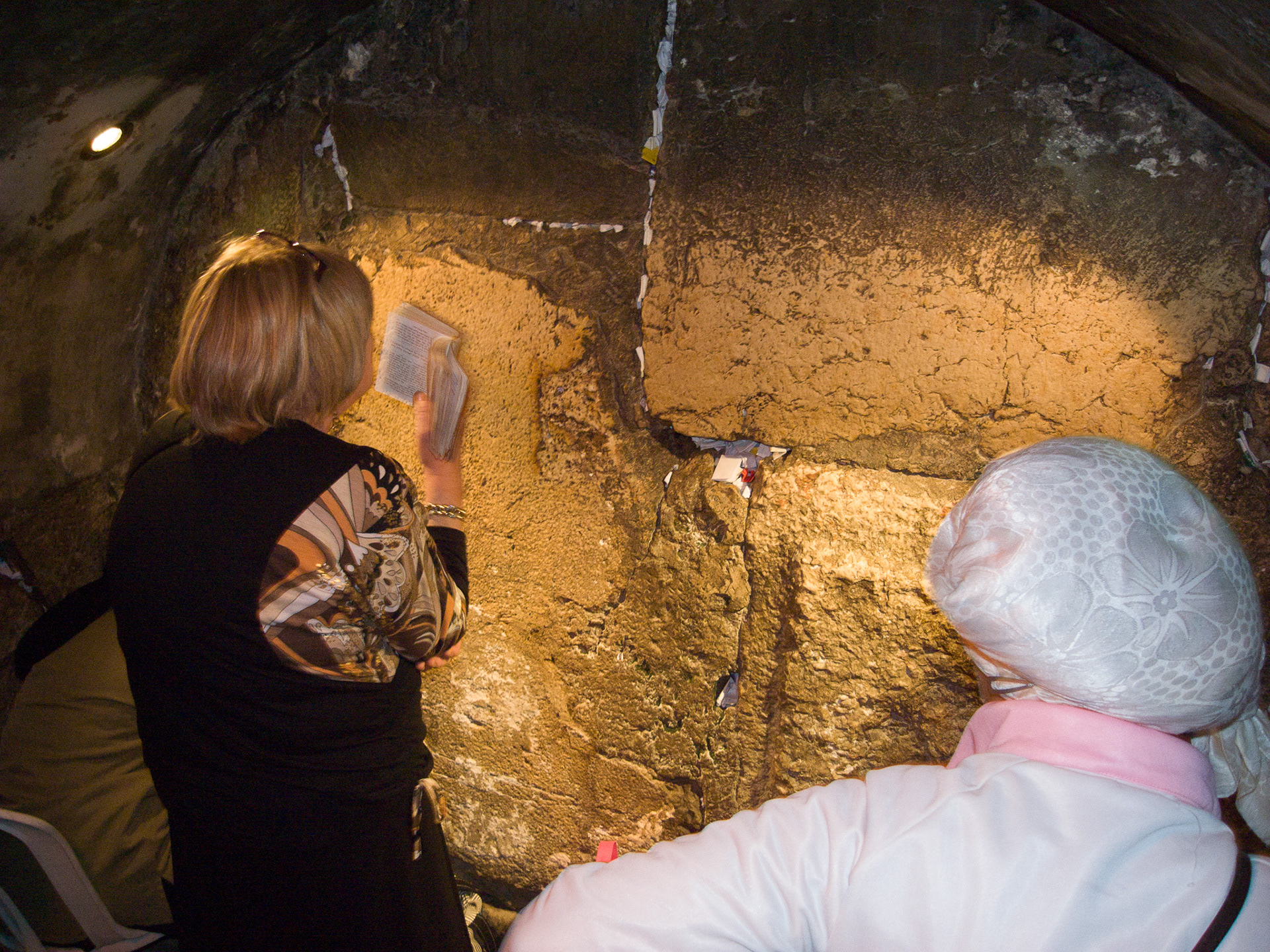 Women pray in the tunnels below the surface of the Western Wall in Jerusalem.