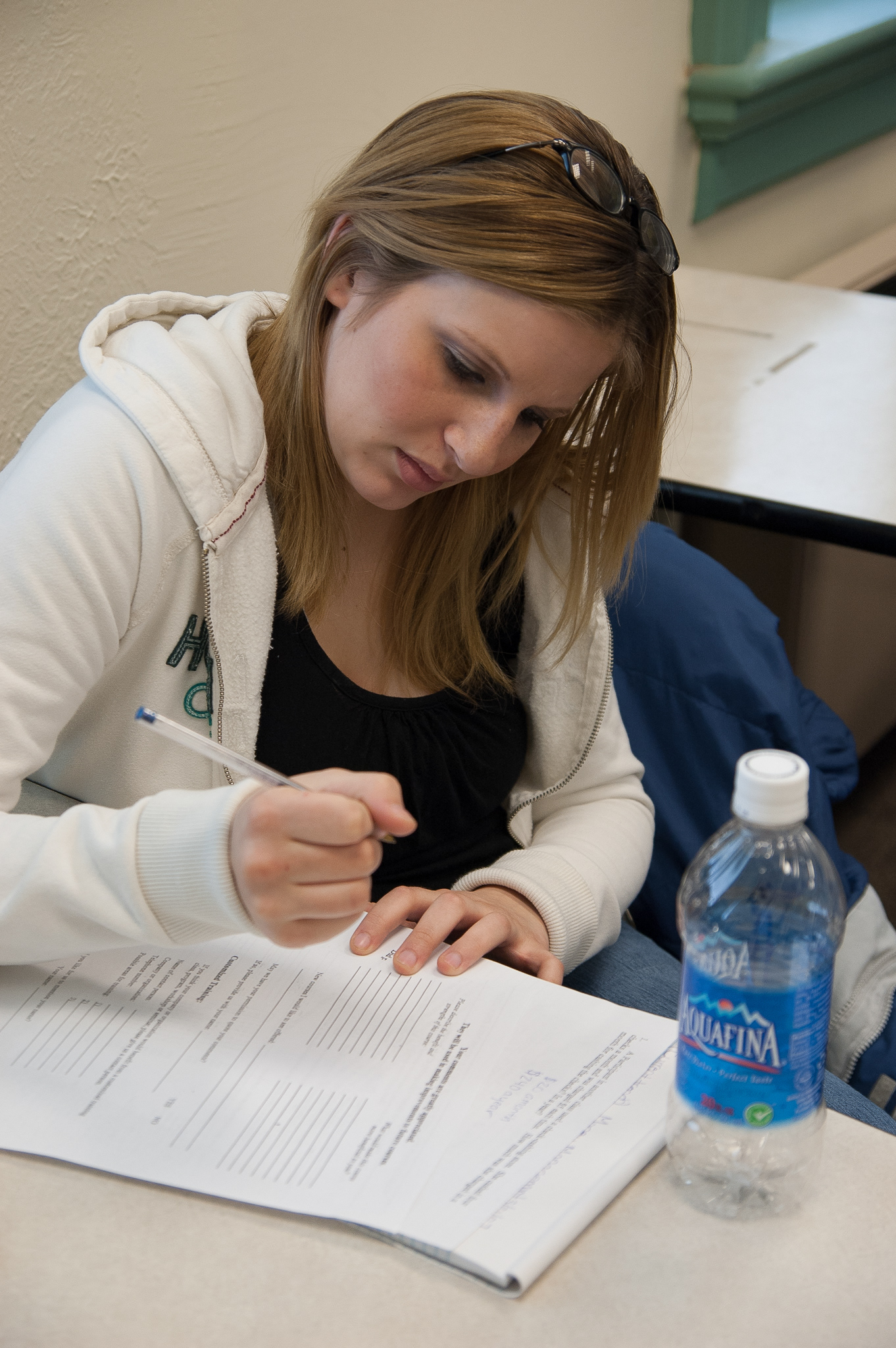 Ruth Pearce completes an accounting exercise at the Warren County One Stop GED program.