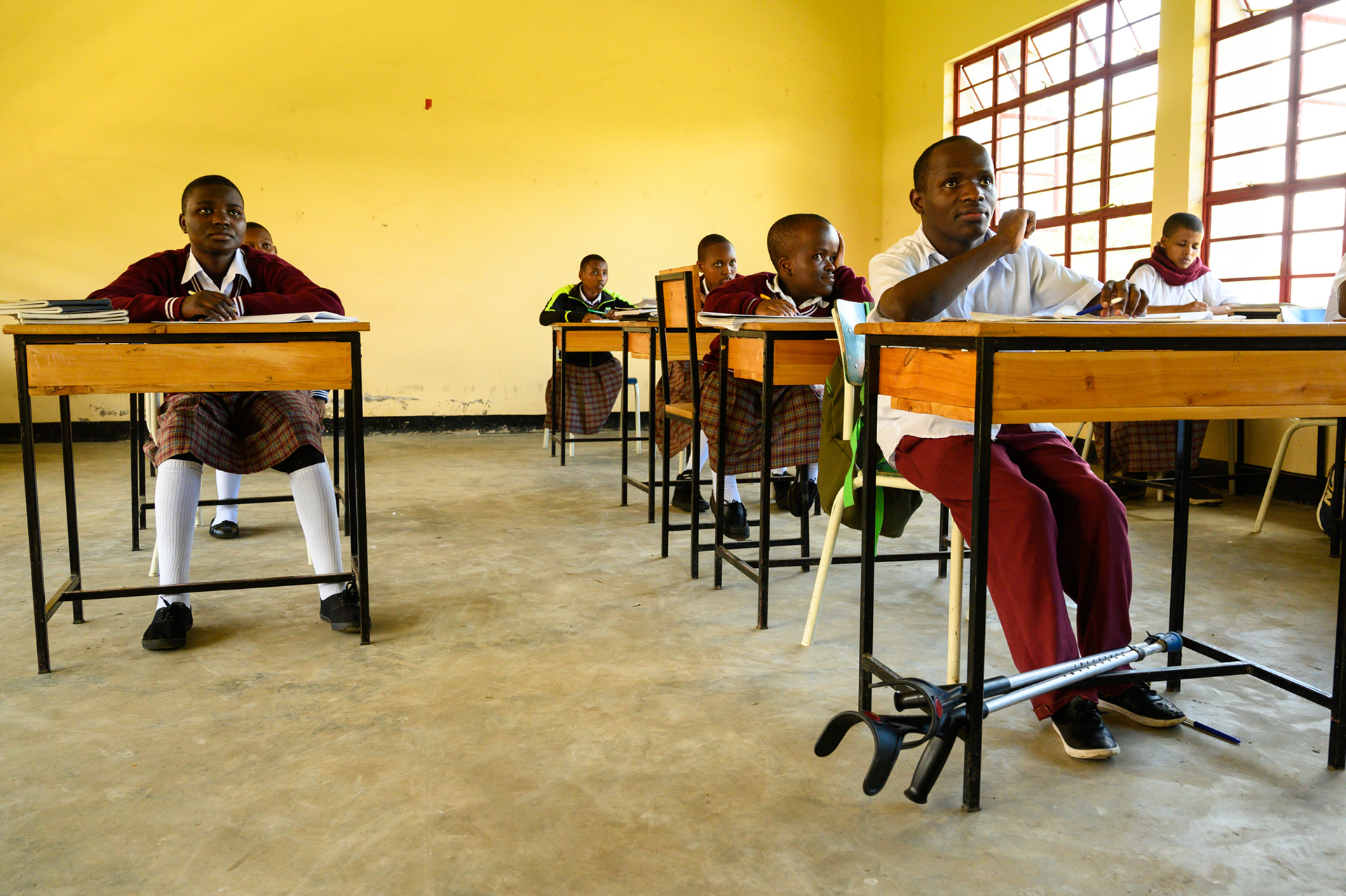 Students at the new secondary school on the campus of the Usa River Rehabilitation & Vocational Training Center near Kilimanjaro, Tanzania. Both are ministries of the Evangelical Lutheran Church of Tanzania. The school features integrated classroom of students with varied abilities - a unique mix in Tanzania.