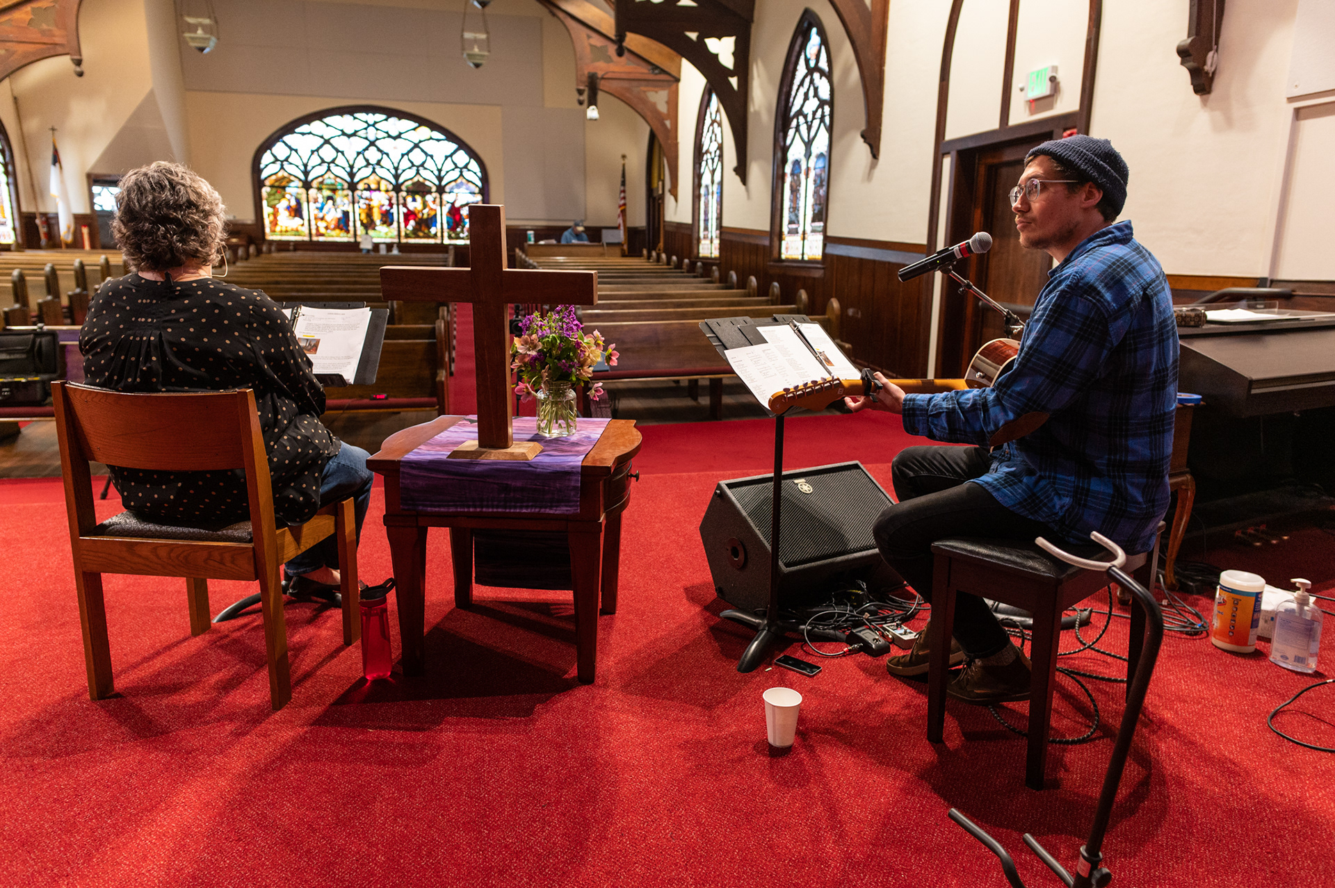 Pastor Stephanie Hankey and musician John Van Deusen live stream the 2020 Good Friday service from Westminster Presbyterian Church with an empty sanctuary.