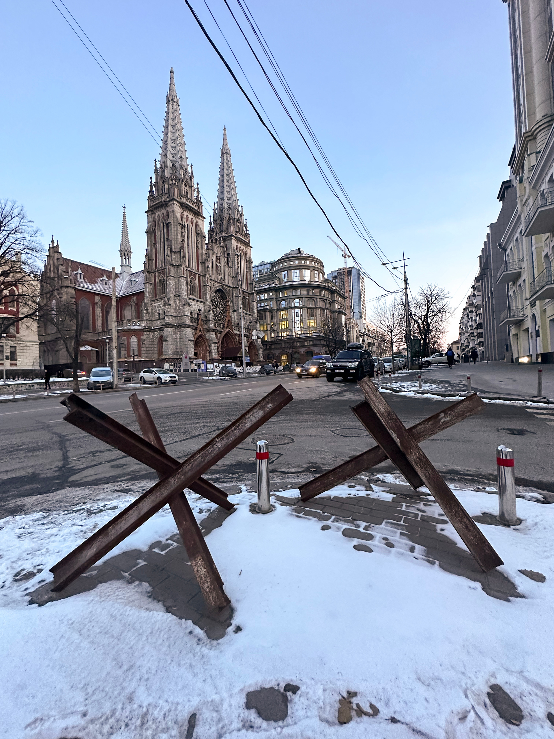 Anti-tank barriers on the street corners near the Roman Catholic cathedral in Kyiv, Ukraine.