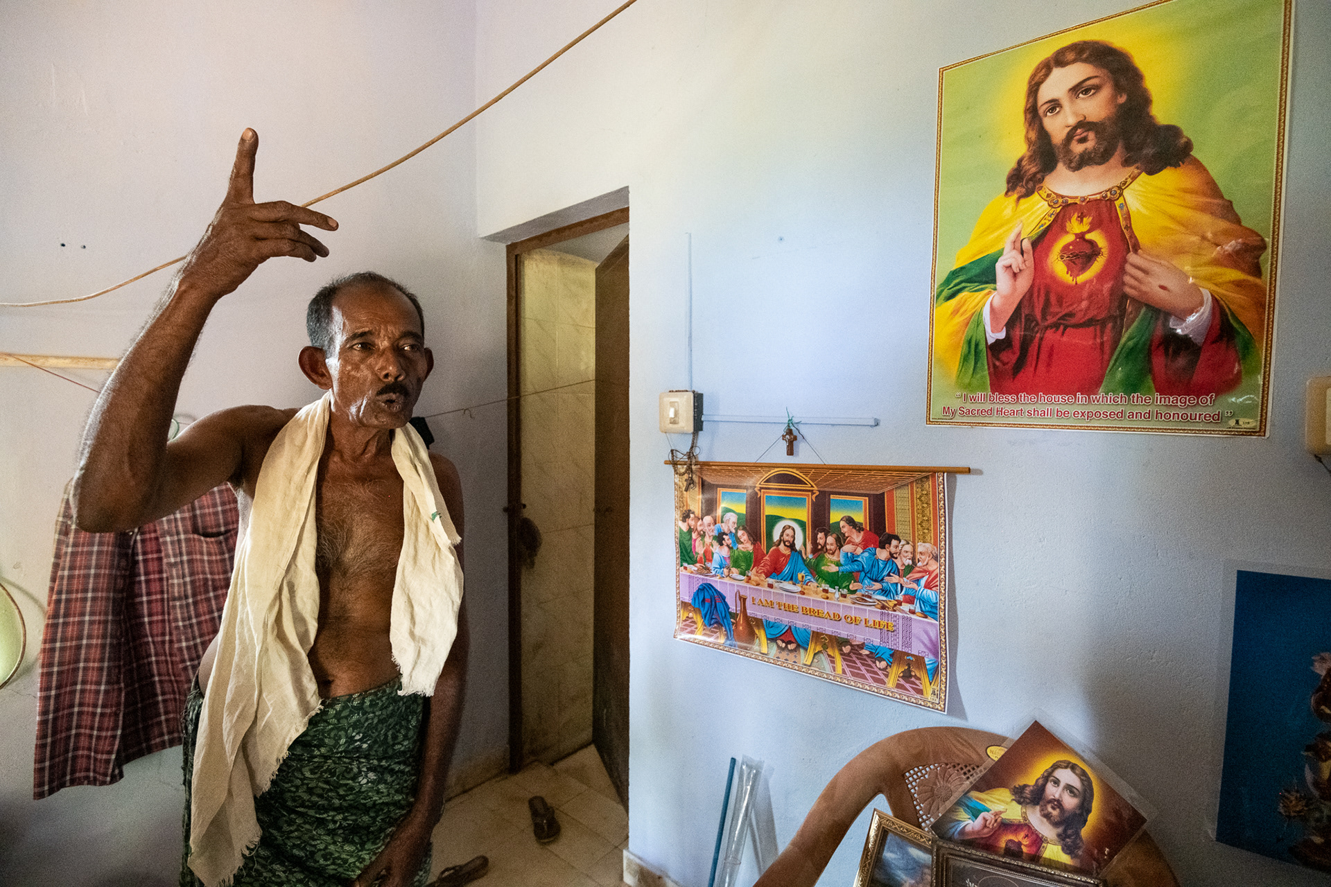 Thomas Nillekl explains how he escaped the August 14-18, 2018 flood waters that covered his home. ACT Alliance partner CASA (Church's Auxiliary for Social Action) provided emergency kits and household goods to Nillekl and his neighbors as they returned to their destroyed homes. 