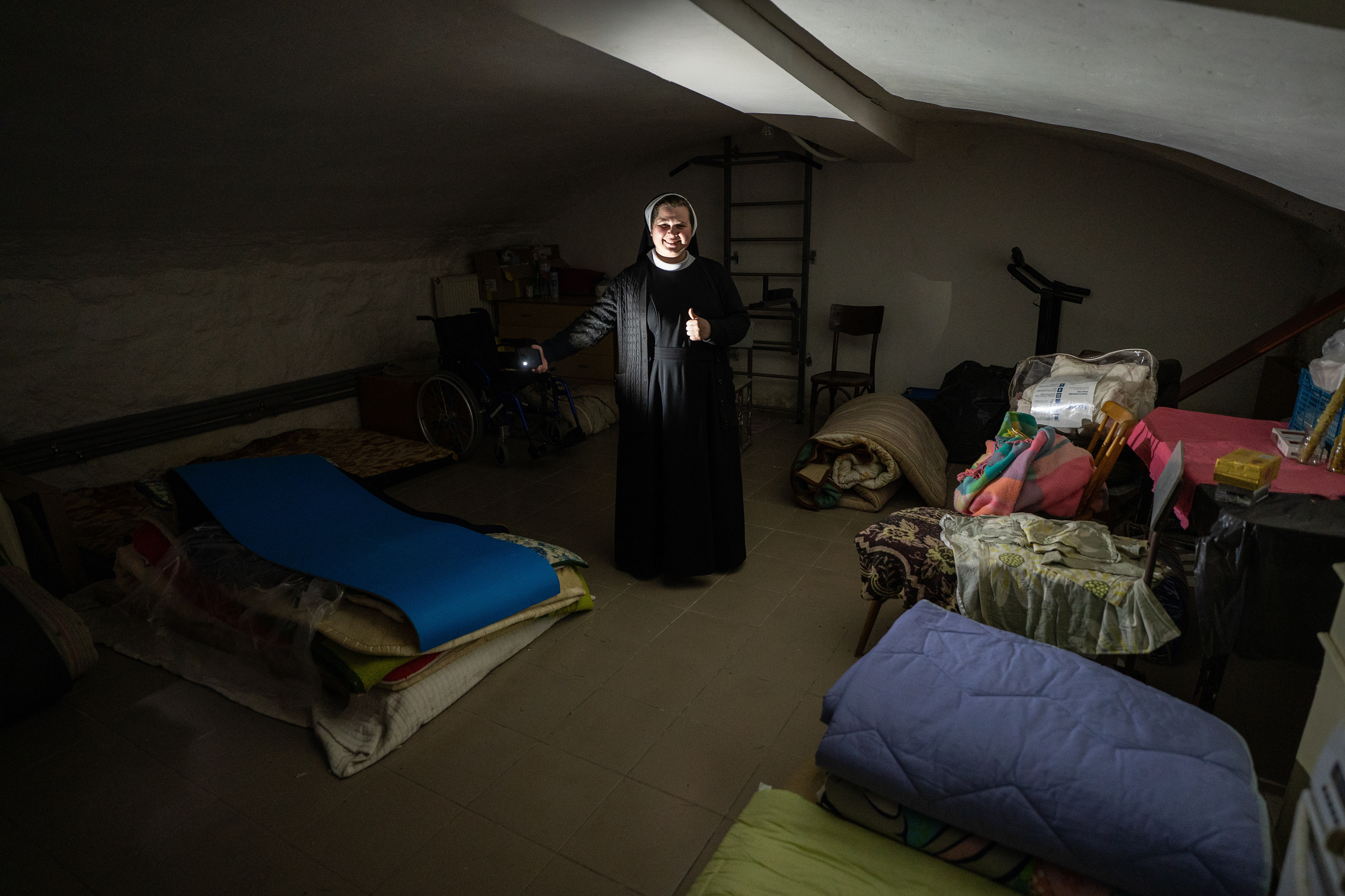 Basilian sister Anna Andrusiv in Lviv, Ukraine, in the convent basement where she, her fellow sisters and 40 people who fled the fighting last spring slept and stayed during air raid warnings.