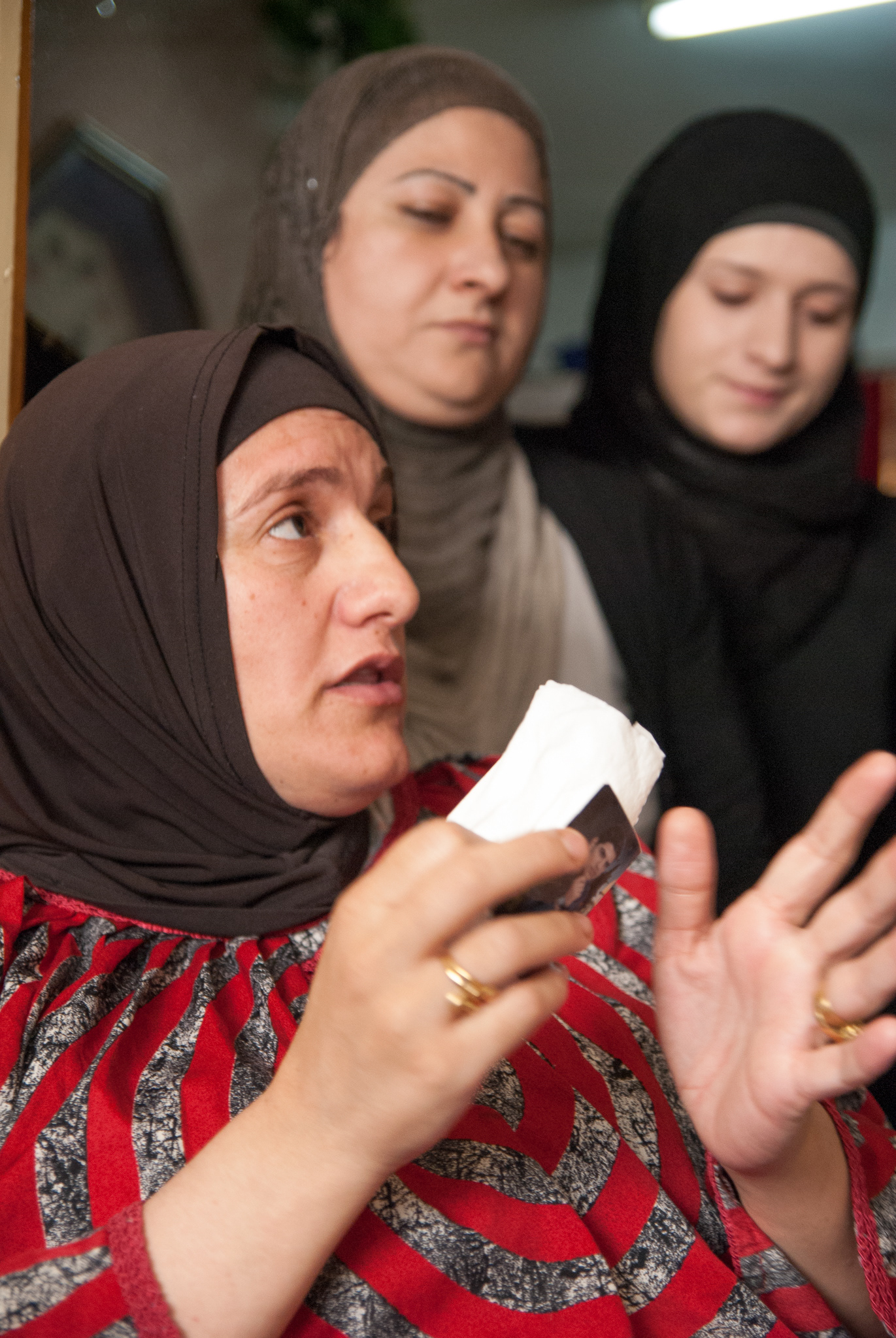 This woman hold a photo of her son who was killed by Israeli settlers at the gate of the Jalazone refugee camp in Ramallah, Palestine.