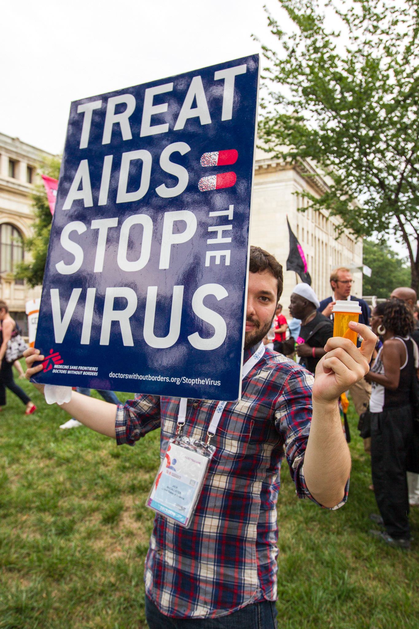 Jack MacCalister calls for better access to generic antiretroviral drugs that help those living with HIV live healthy lives. Protest march July 24 during the 2012 International AIDS Conference in Washington, D.C.
