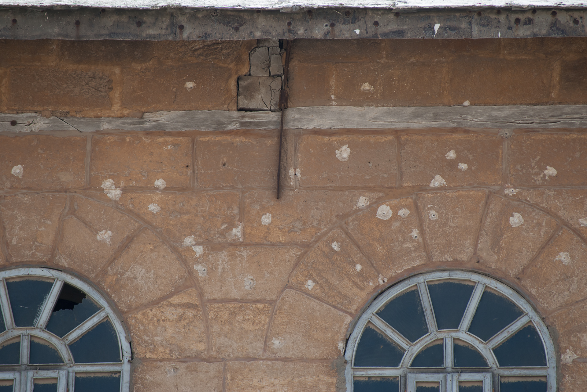 Bullet holes riddle the exterior of the Church of the Nativity in Bethlehem.