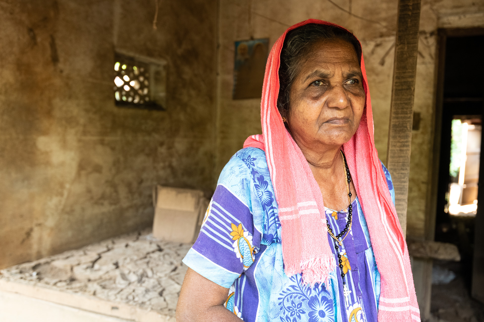 Annie Xavier' home was covered in water during the August 14-18 flooding in Kerala, India. Caked mud coats all surfaces and Ms. Xavier has not moved back into her home due to structural damage. 