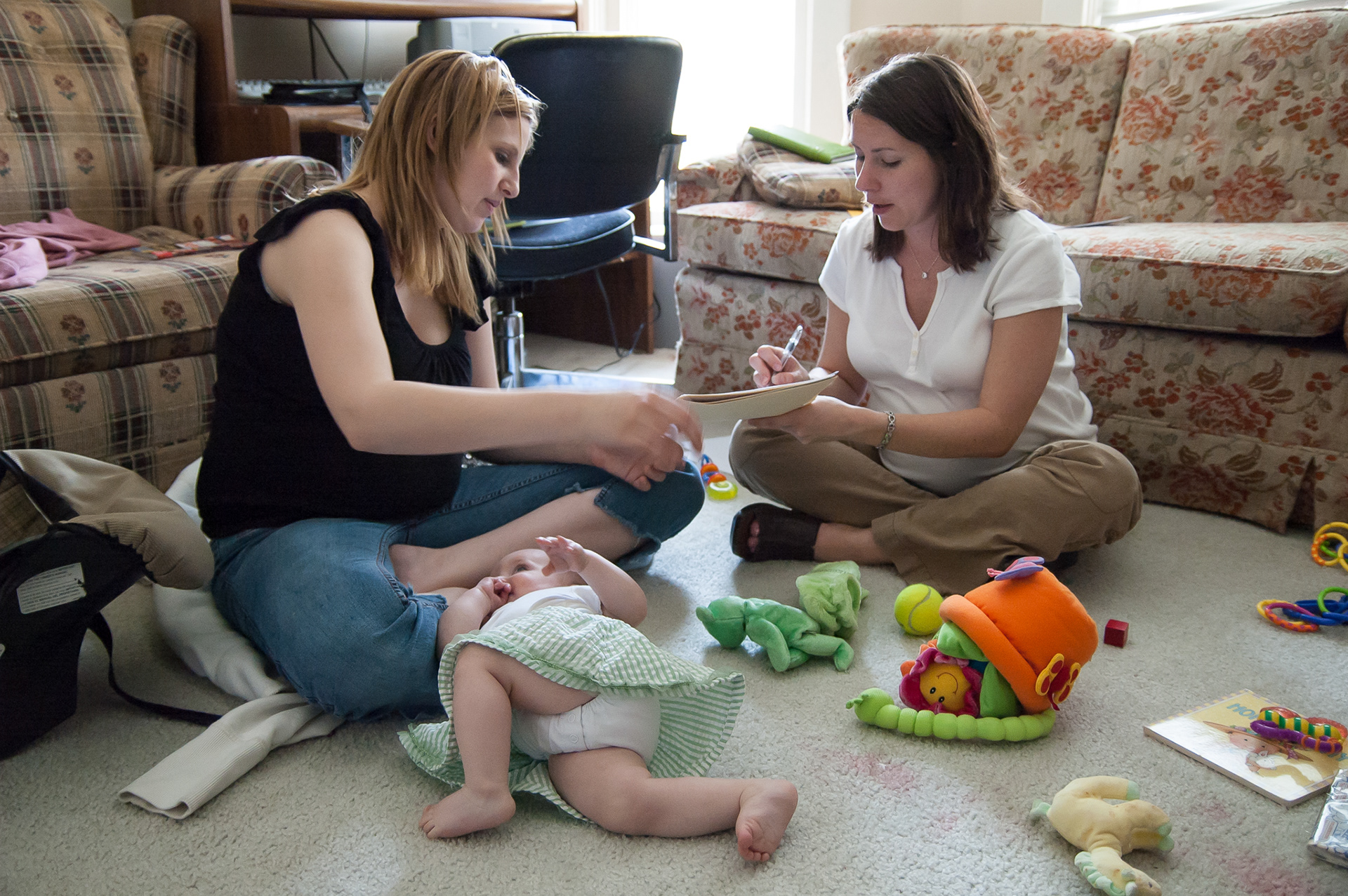 Ruth and Hadley meet with Kazi McDowell, a case worker for Help Me Grow of Warren County. This social service agency ensures infants and toddlers are developing on schedule and assist if necessary.