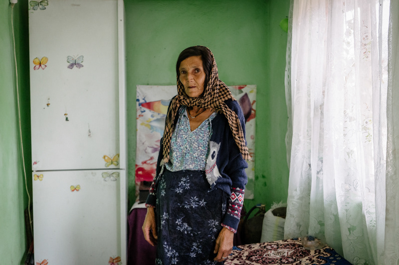 Liliana's mother, posing in their house's hallway. Ocolna village, Dolj county.