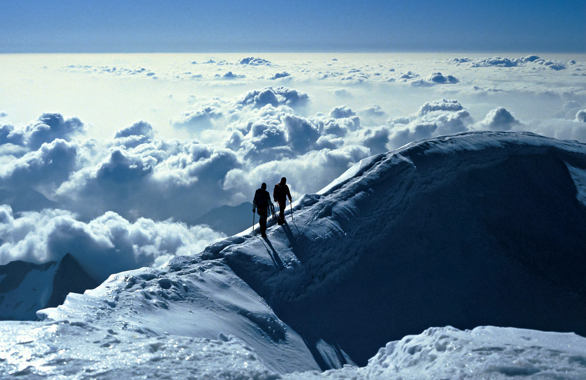 Two climbers on the summit ridge of Weissmies