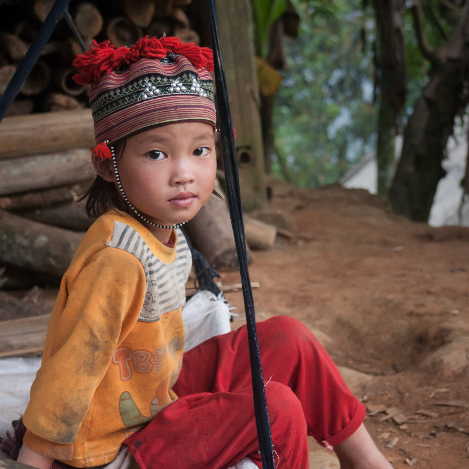 She was very intrigued.  Well, just picture me: a foot too tall, very pale, blue eyes, and not to forget the big camera.  It does look two ways:-)
