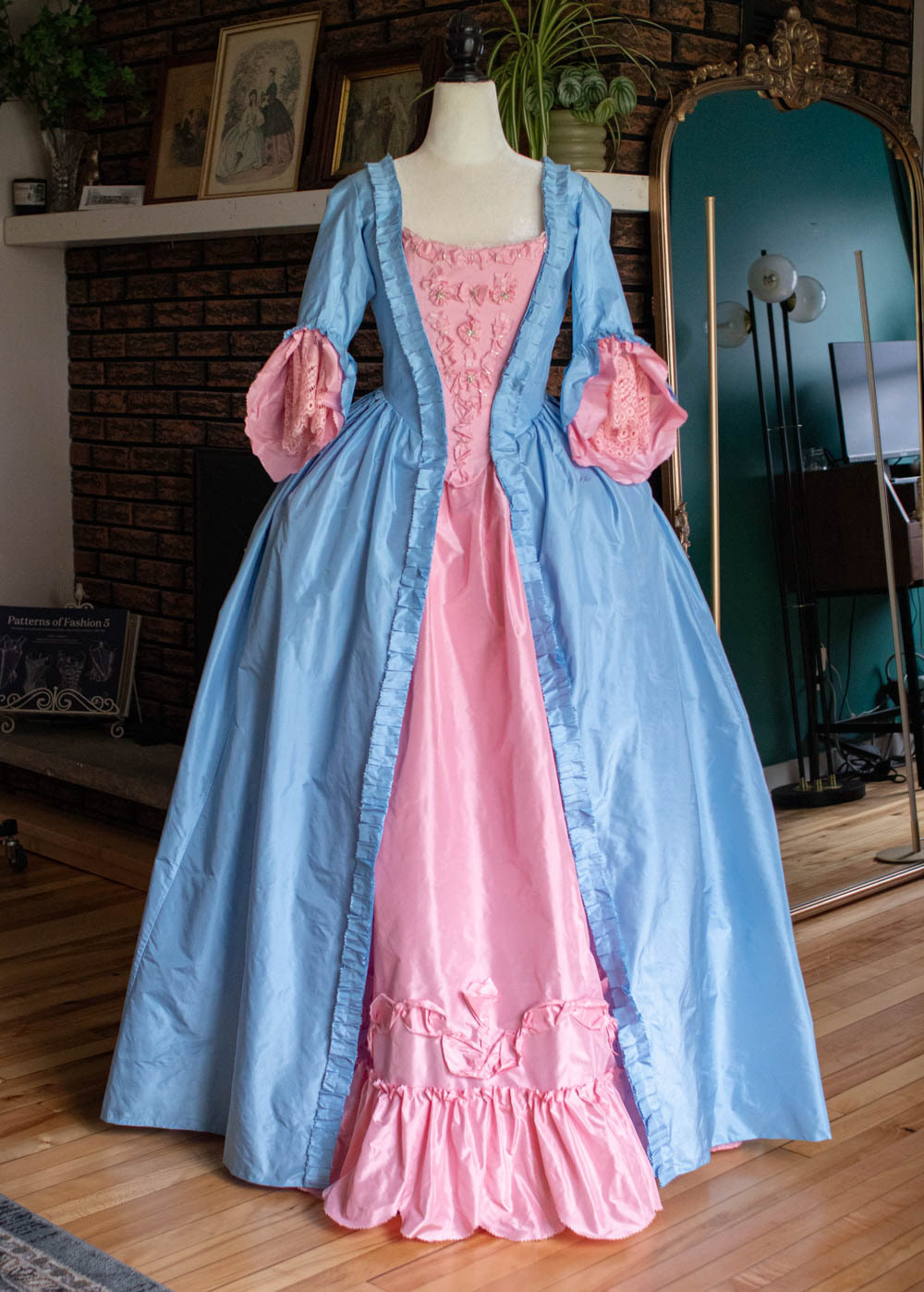 18th century gown in silk taffeta with hand pleated robings, and  stomacher and petticoat detailing