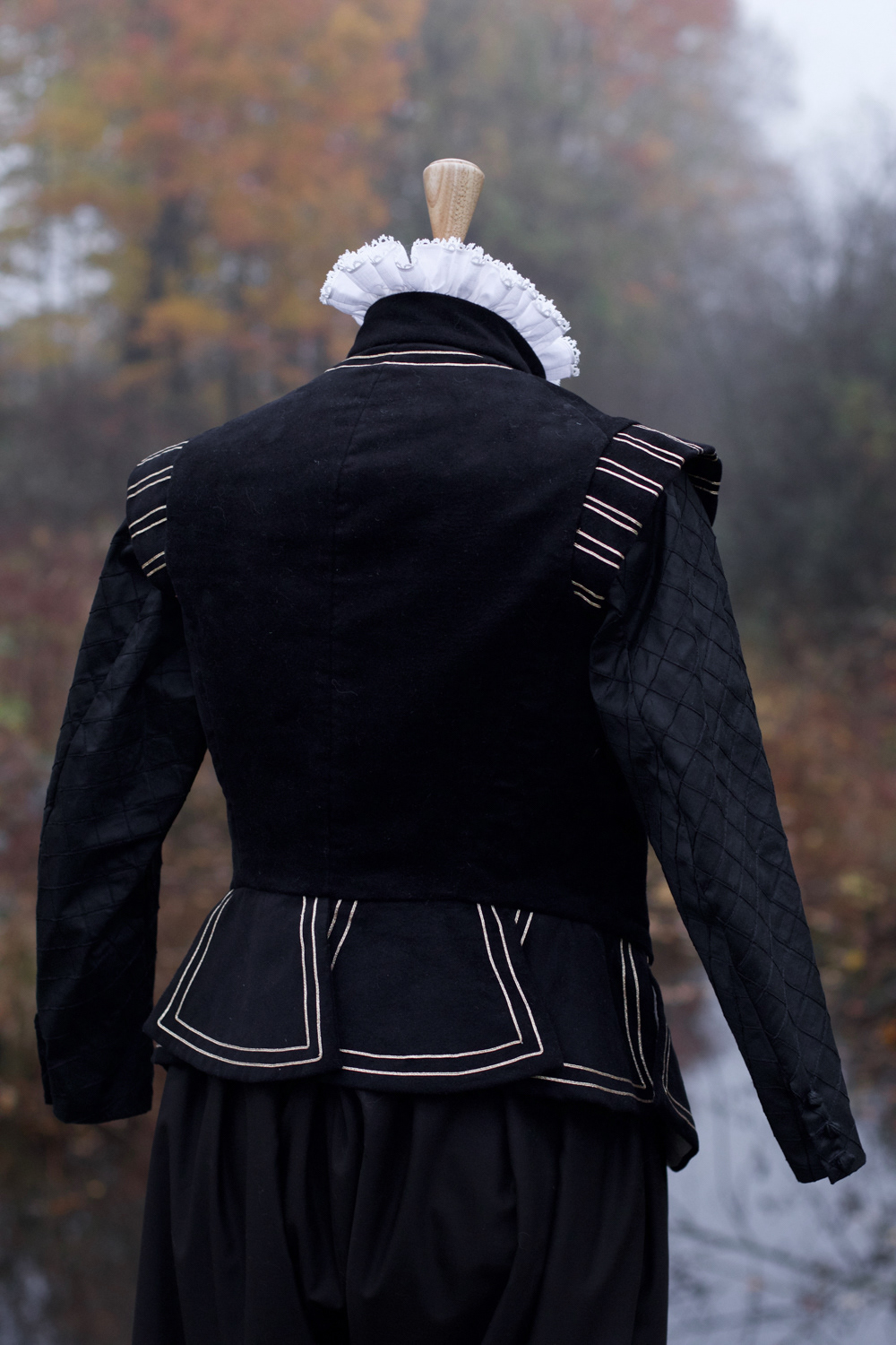 An Elizabethan doublet in cotton moleskin/fustian with braided detailing and silk sleeves.