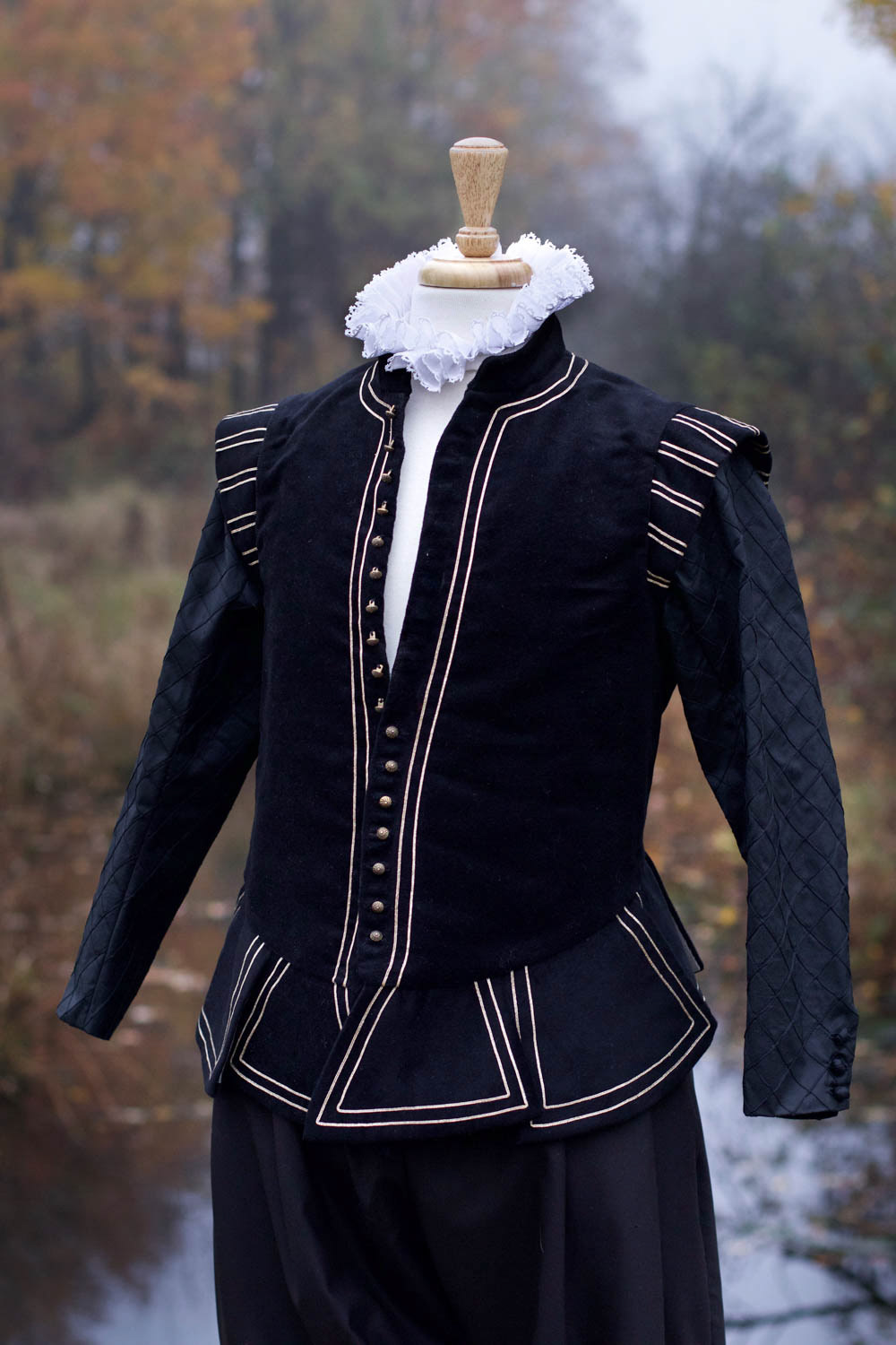 An Elizabethan doublet in cotton moleskin/fustian with braided detailing and silk sleeves.