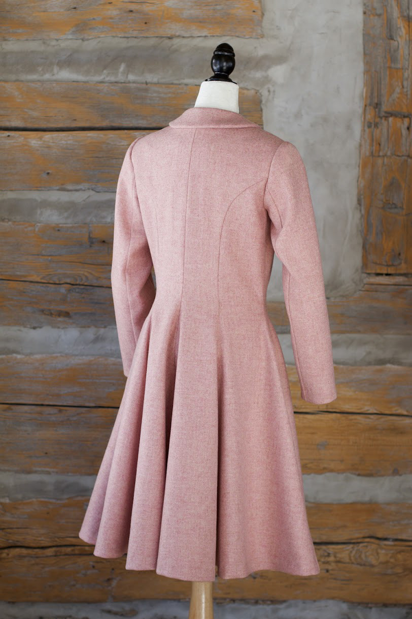A 1950s-inspired 100% wool coat in soft pink