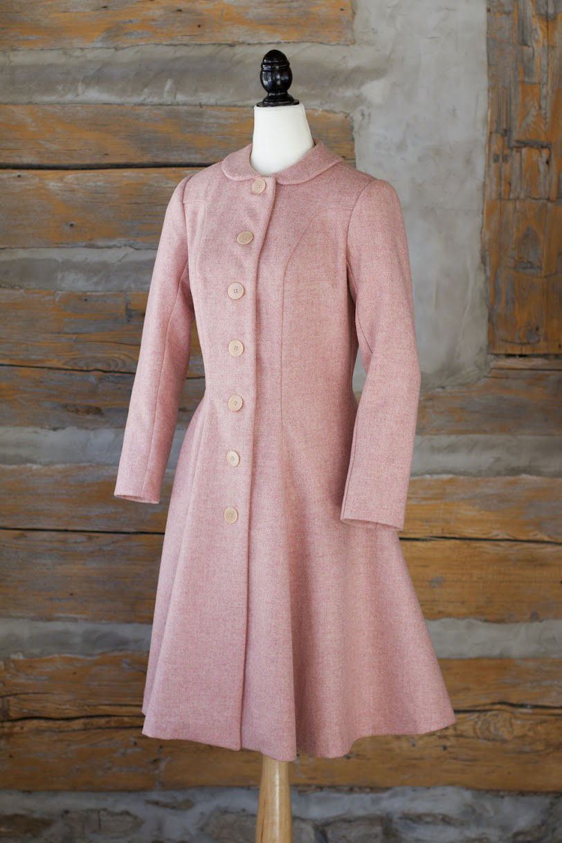 A 1950s-inspired 100% wool coat in soft pink