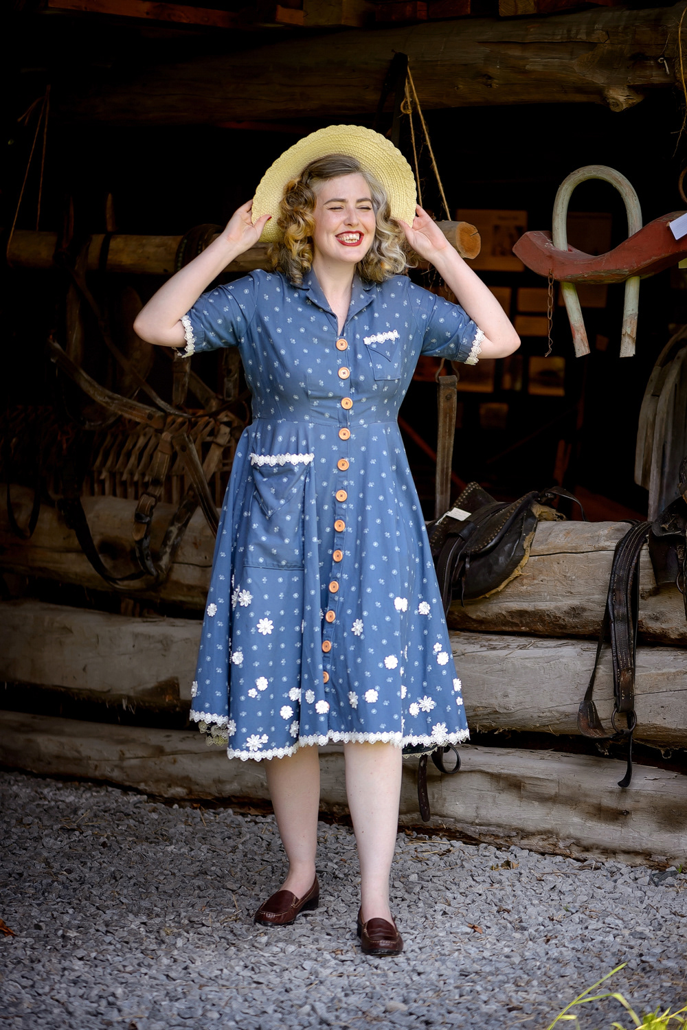 Early 1950s Bee Dress: This playful cotton twill day dress is brought to life with careful hand-stitched lace appliqué detailing on the skirt.
