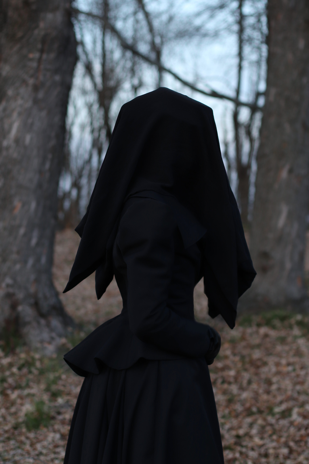 Victorian mourning gown in black wool with crepe silk veil. Enquire for Bespoke pricing