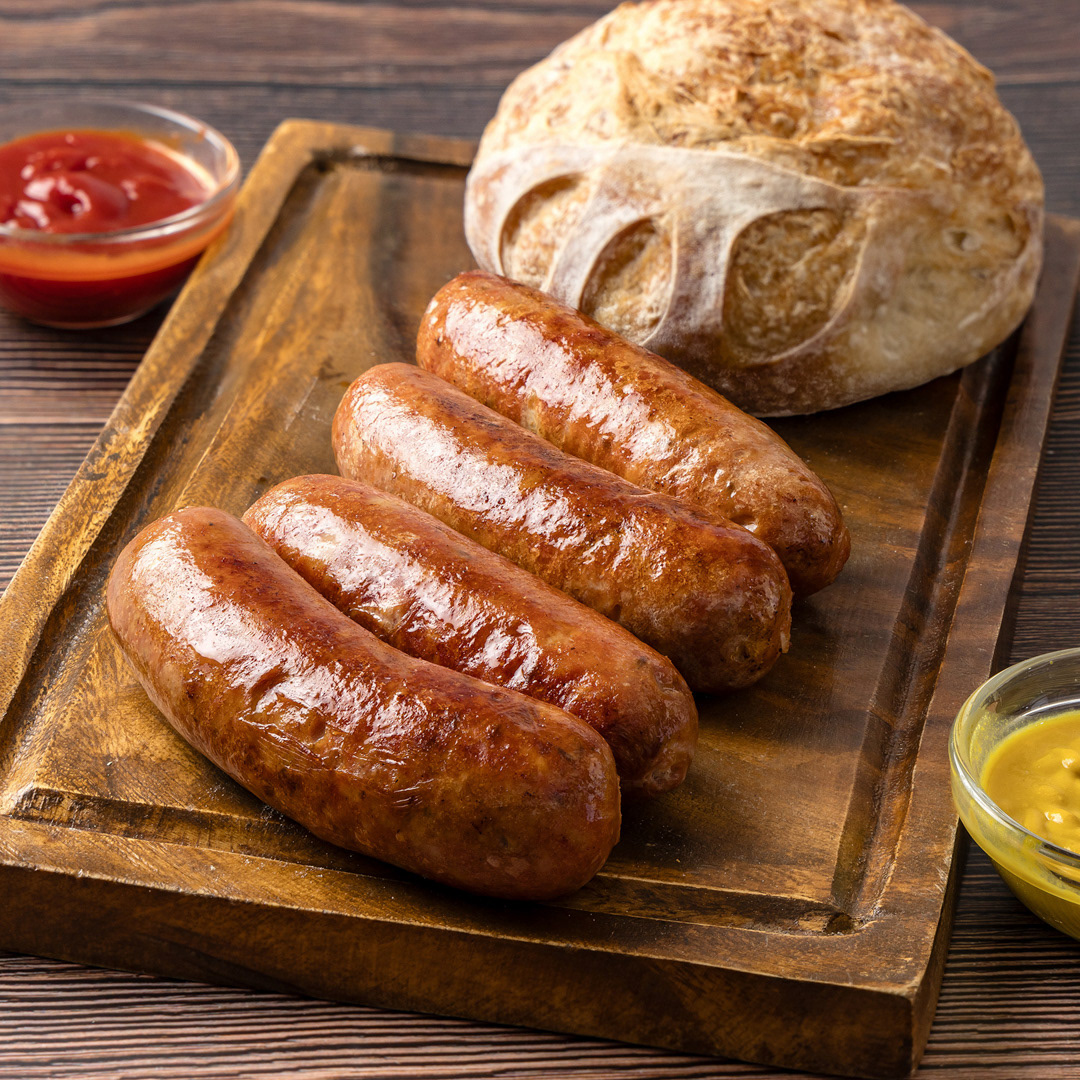 A product photo of delectable sausages. This food photograph serves as na introductory image to a gallery of savory food photography by a professional food photographer with 3 decades of experience.