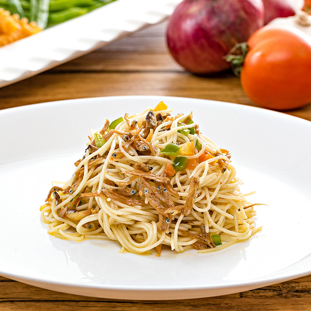 A product photograph of a gourmet pasta dish. This image serves as an introductory image to a food photography gallery by Metro Manila Food Photographer Louie Aguinaldo